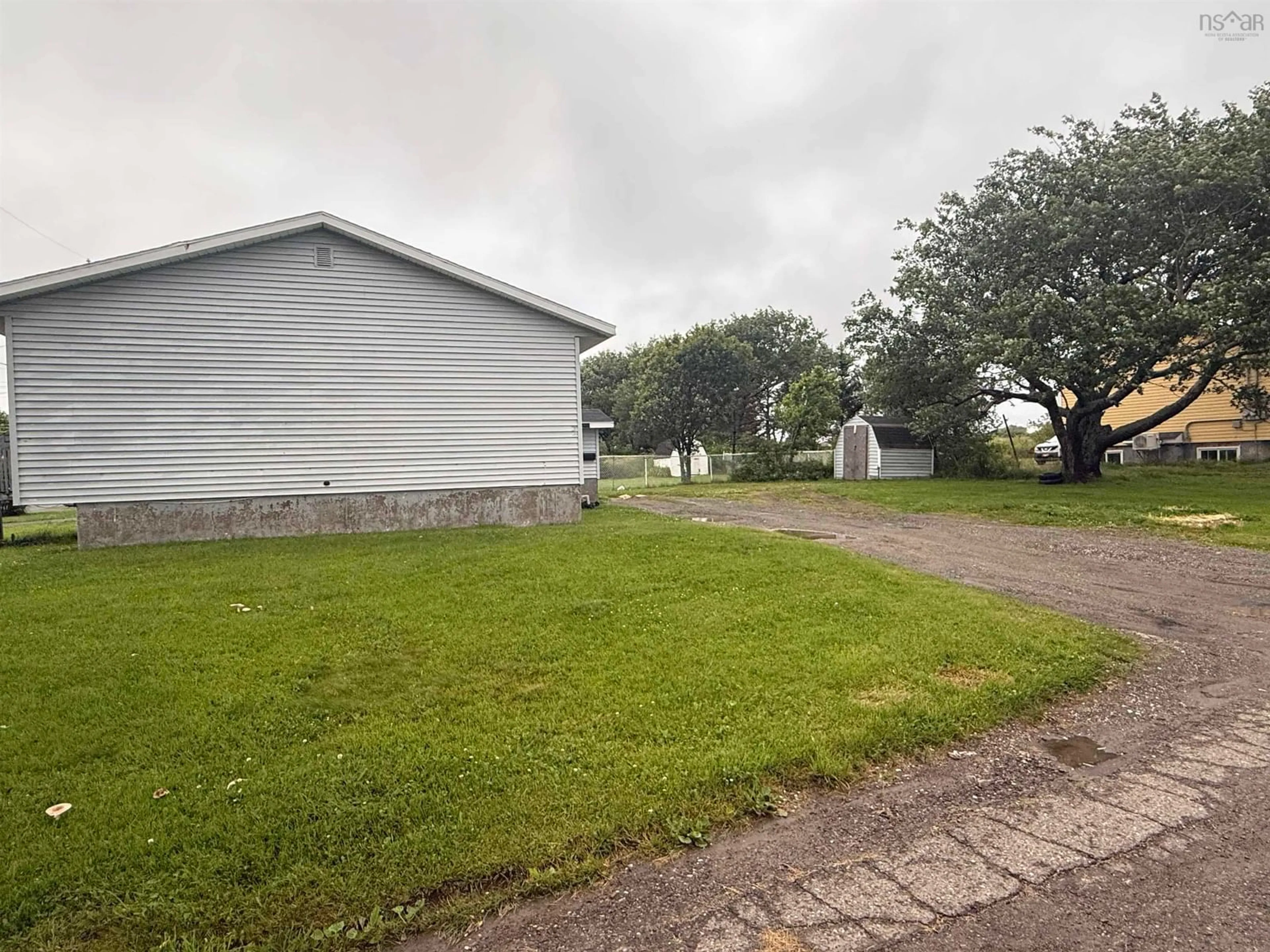 A pic from outside/outdoor area/front of a property/back of a property/a pic from drone, unknown for 384 Fourteenth St, New Waterford Nova Scotia B1H 4V8