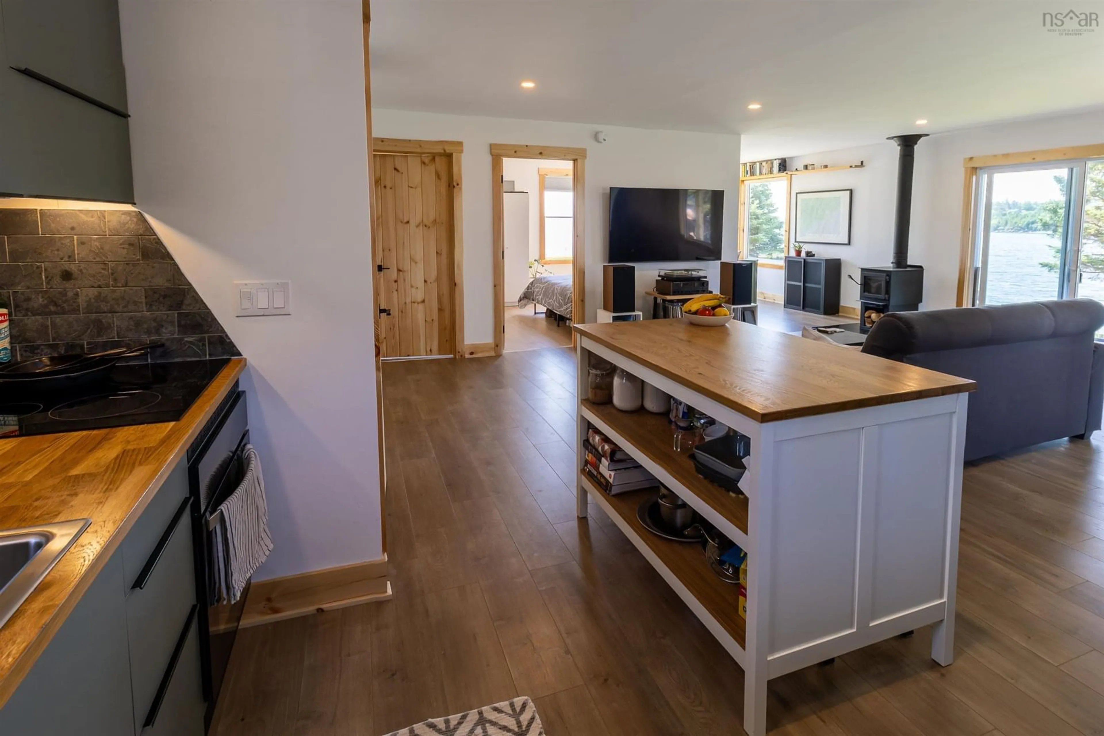 Open concept kitchen, wood/laminate floor for 12721 Highway 316, Goldboro Nova Scotia B0H 1L0