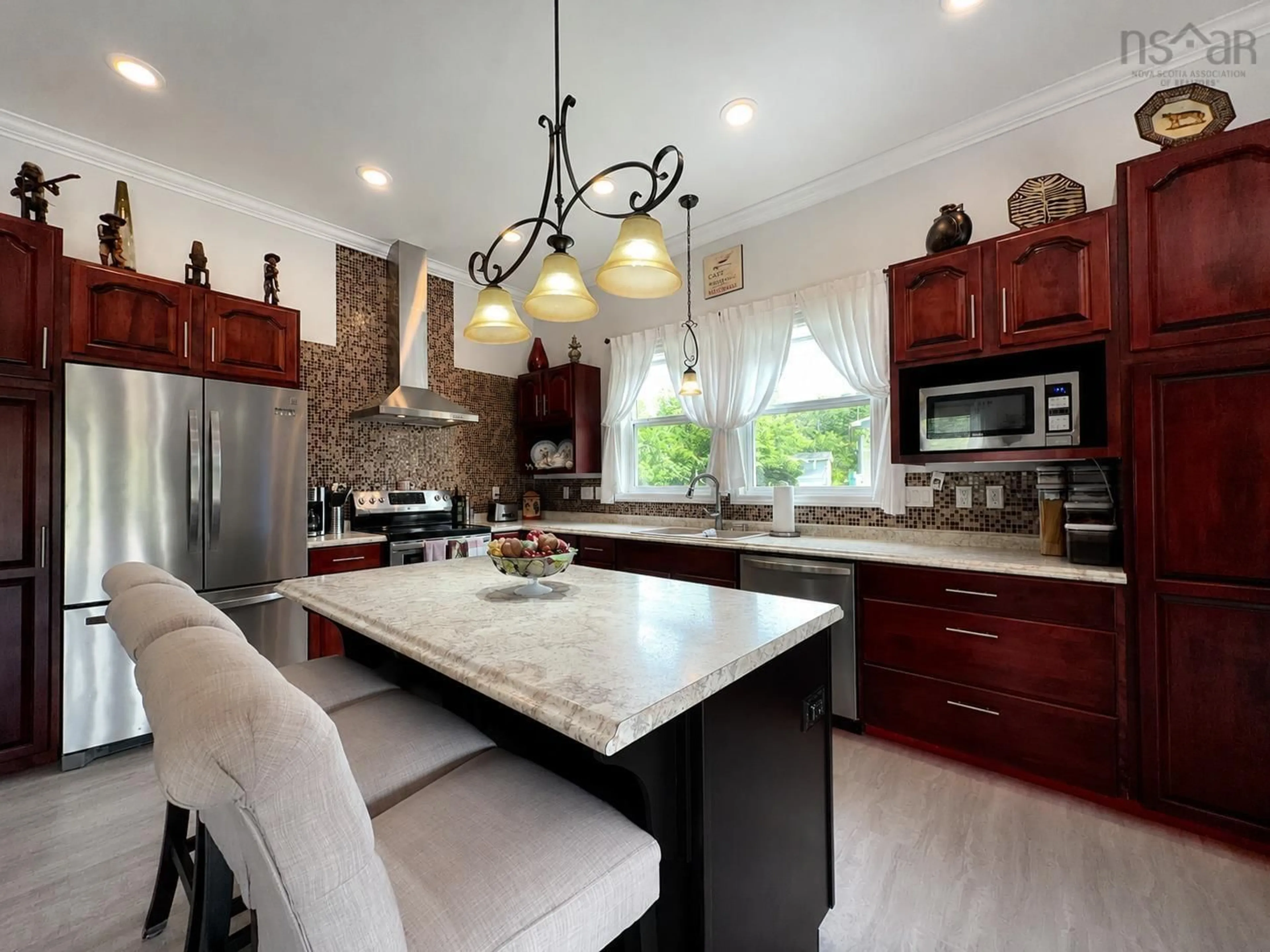 Open concept kitchen, ceramic/tile floor for 19203 Highway 19, Southwest Margaree Nova Scotia B0E 3H0