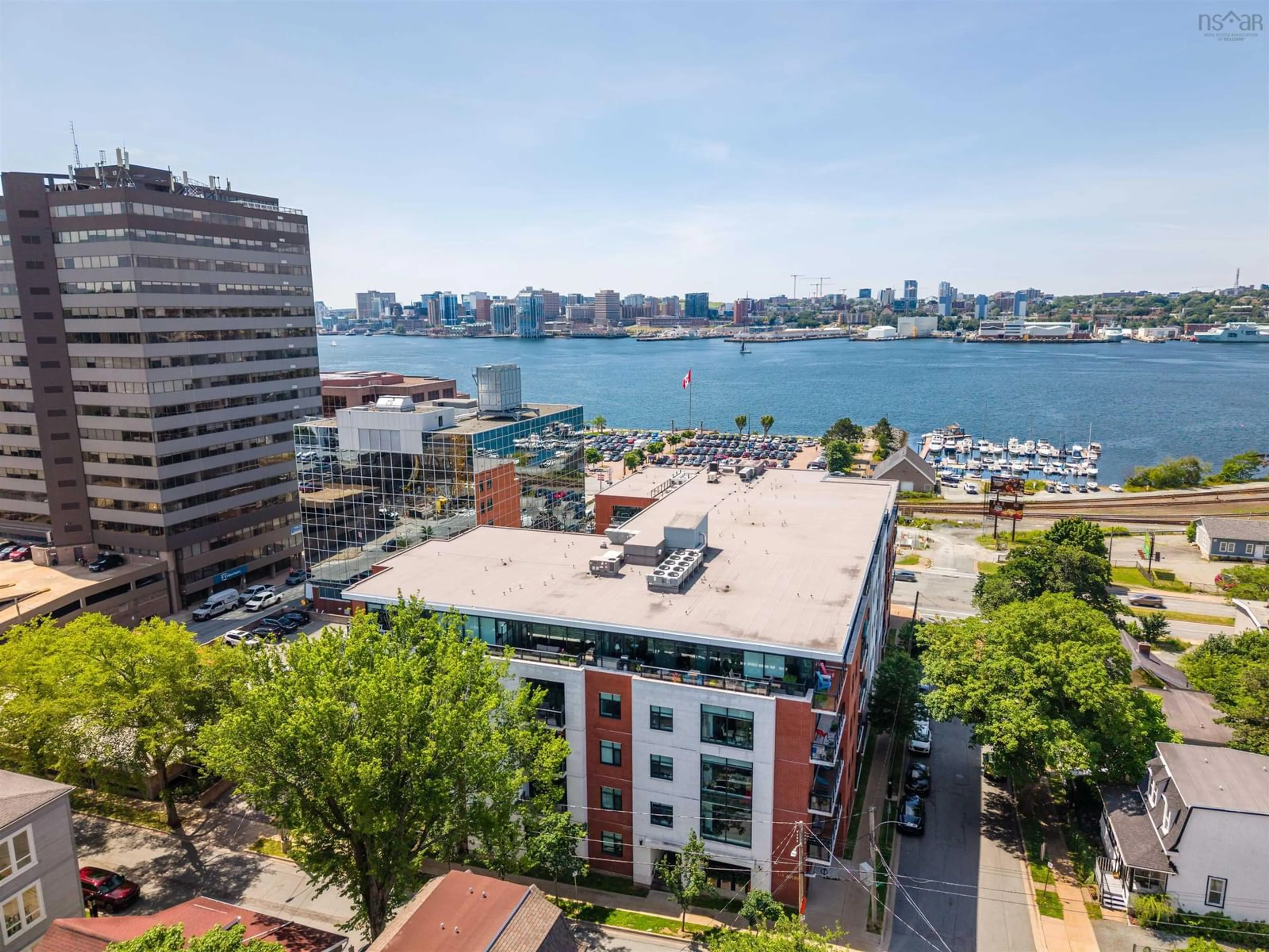 A pic from outside/outdoor area/front of a property/back of a property/a pic from drone, water/lake/river/ocean view for 25 Alderney Dr #310, Dartmouth Nova Scotia B2Y 0E4
