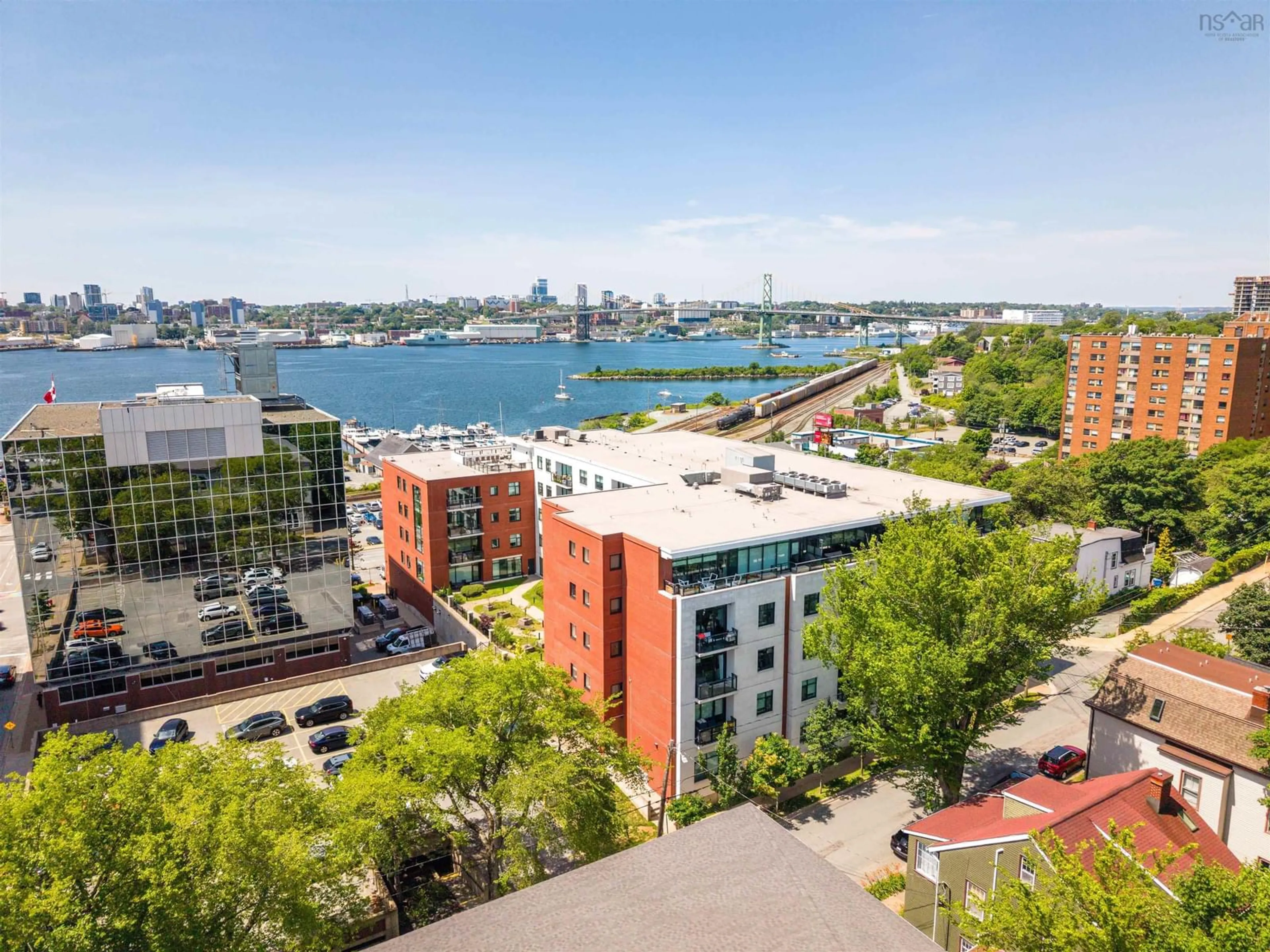 A pic from outside/outdoor area/front of a property/back of a property/a pic from drone, water/lake/river/ocean view for 25 Alderney Dr #310, Dartmouth Nova Scotia B2Y 0E4