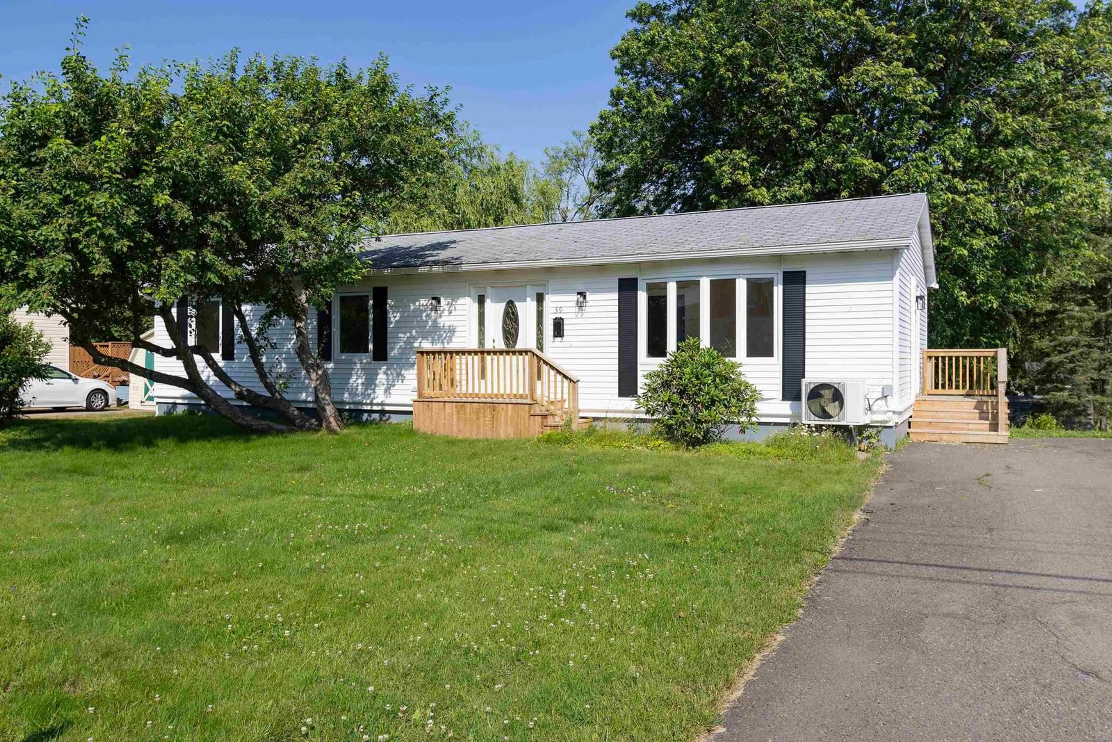 Home with vinyl exterior material, street for 39 Rogers Ave, Amherst Nova Scotia B4H 2J7