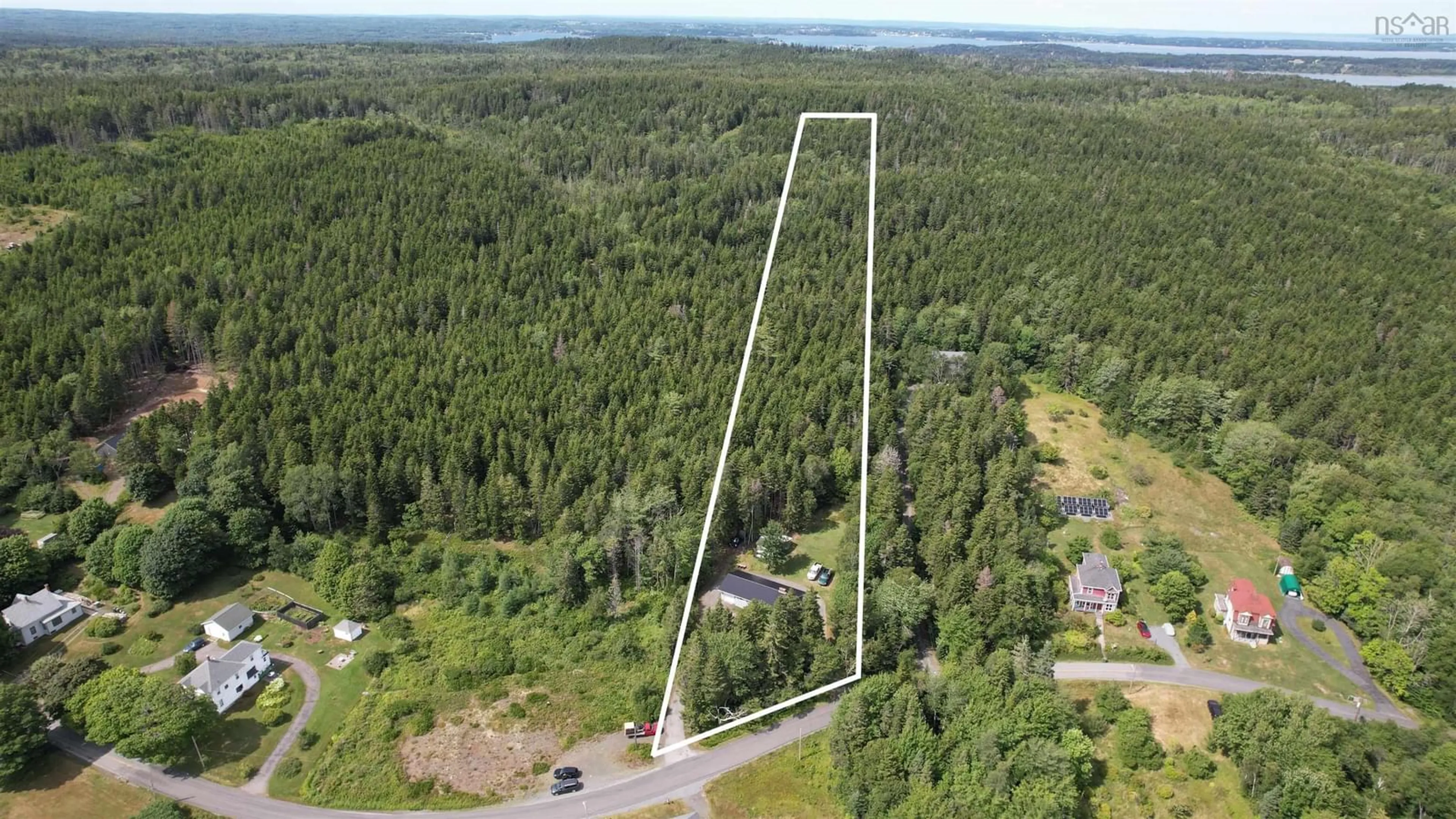A pic from outside/outdoor area/front of a property/back of a property/a pic from drone, forest/trees view for 120 North Side Rd, Riverport Nova Scotia B0J 2W0