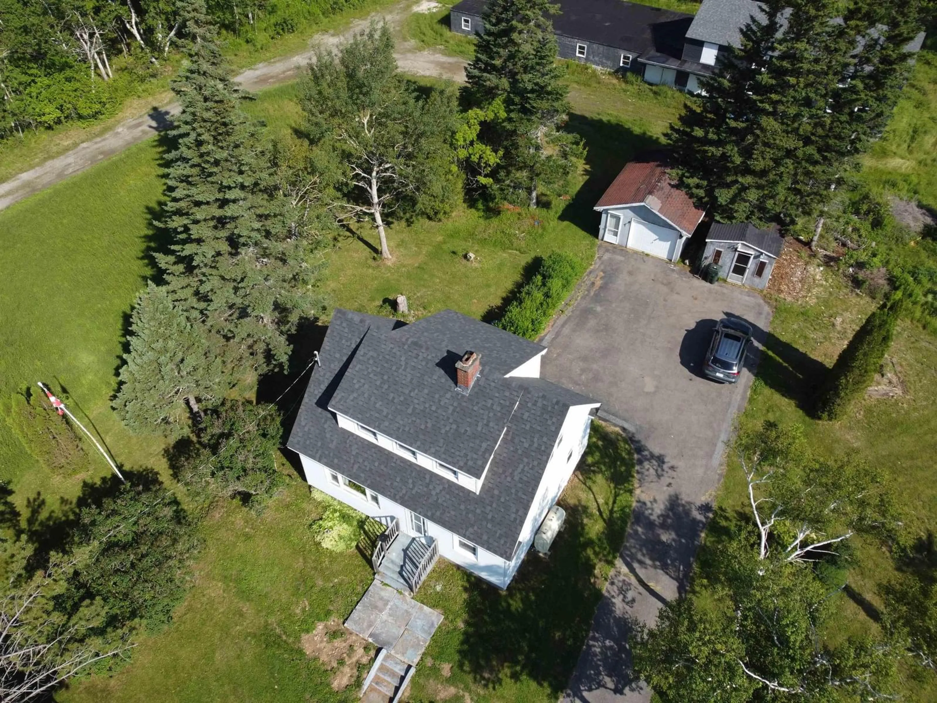 A pic from outside/outdoor area/front of a property/back of a property/a pic from drone, unknown for 1843 Highway 4 Hwy, Reserve Mines Nova Scotia B1M 1A3