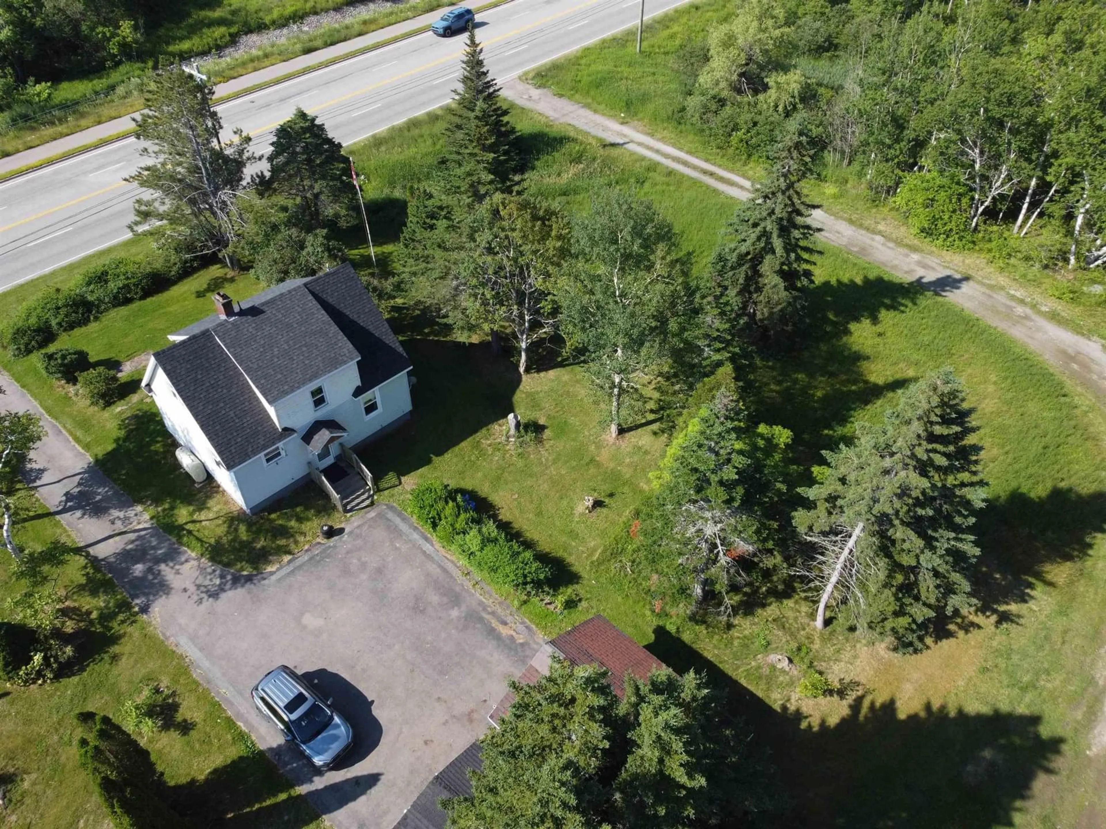 A pic from outside/outdoor area/front of a property/back of a property/a pic from drone, street for 1843 Highway 4 Hwy, Reserve Mines Nova Scotia B1M 1A3