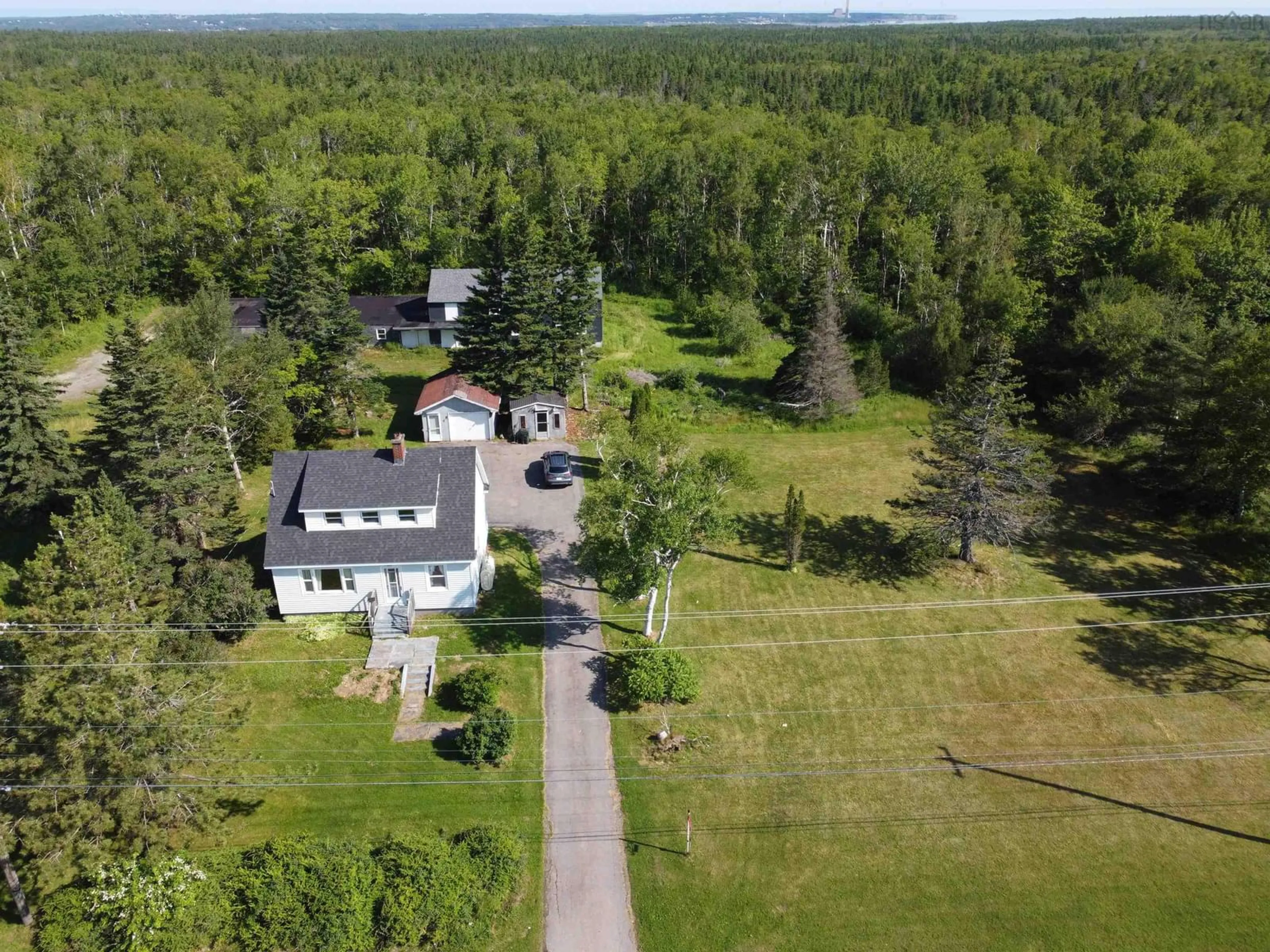 A pic from outside/outdoor area/front of a property/back of a property/a pic from drone, unknown for 1843 Highway 4 Hwy, Reserve Mines Nova Scotia B1M 1A3