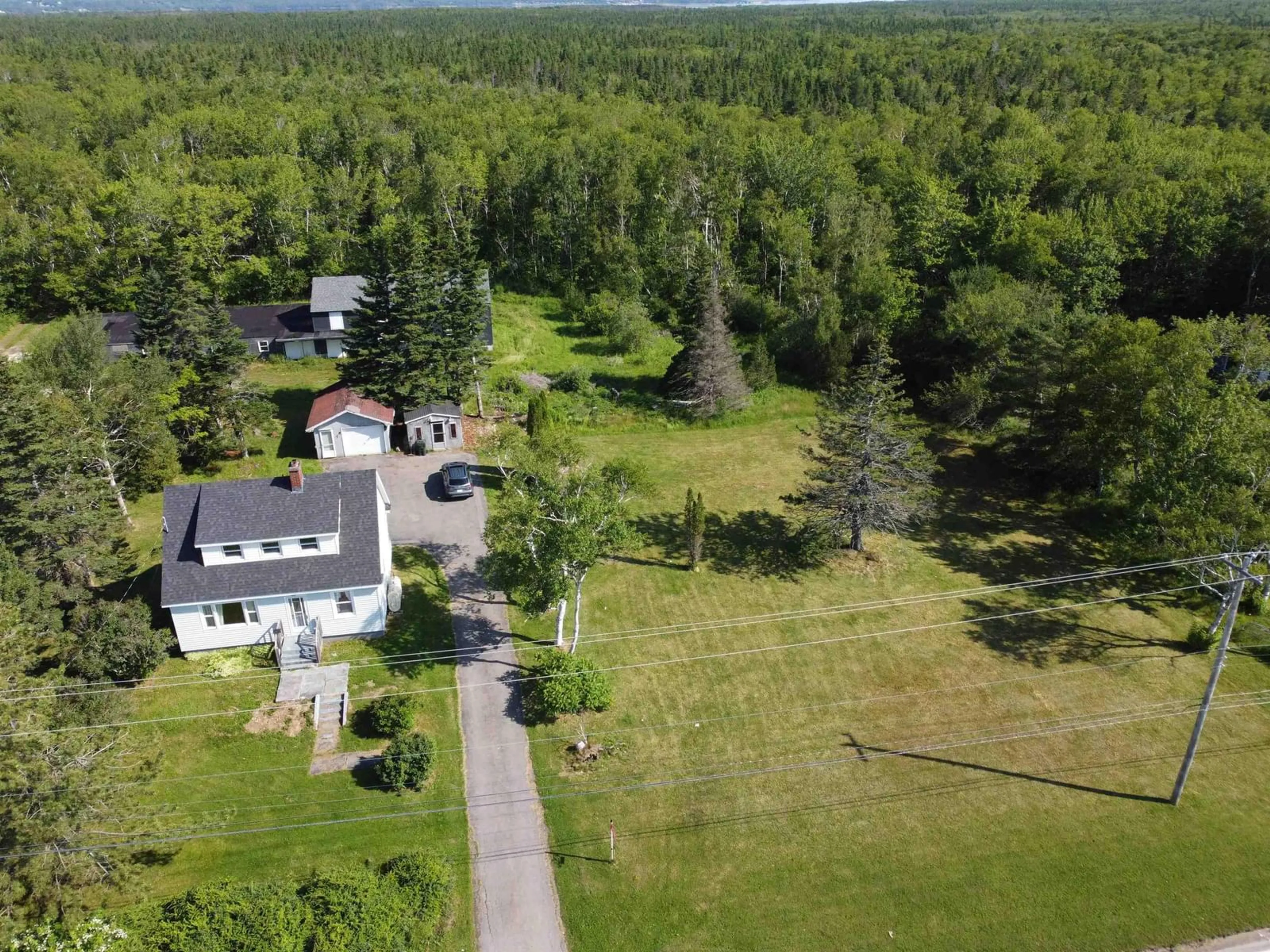 A pic from outside/outdoor area/front of a property/back of a property/a pic from drone, unknown for 1843 Highway 4 Hwy, Reserve Mines Nova Scotia B1M 1A3