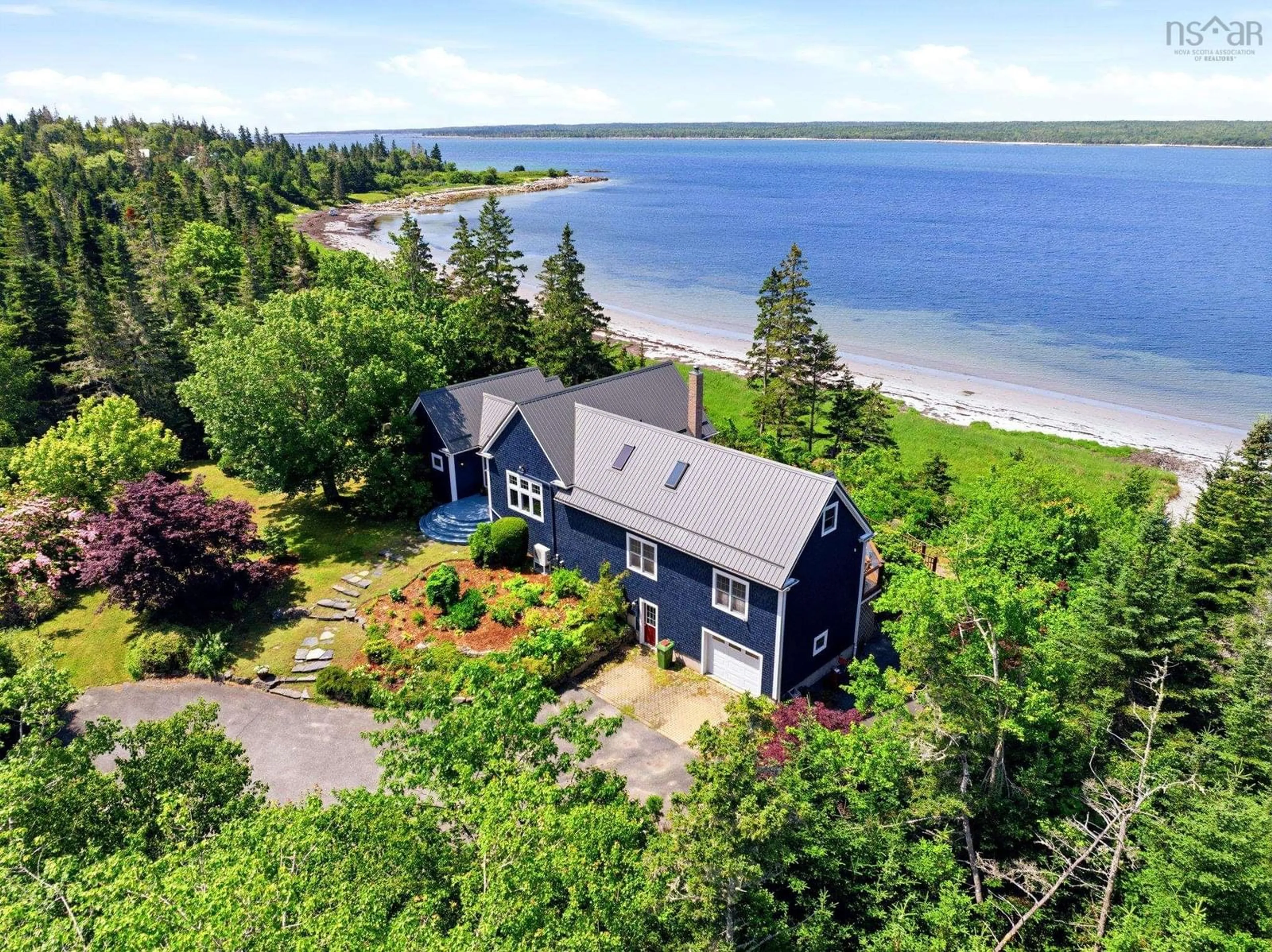 A pic from outside/outdoor area/front of a property/back of a property/a pic from drone, water/lake/river/ocean view for 900 Saint Catherines River Rd, Port Joli Nova Scotia B0T 1S0