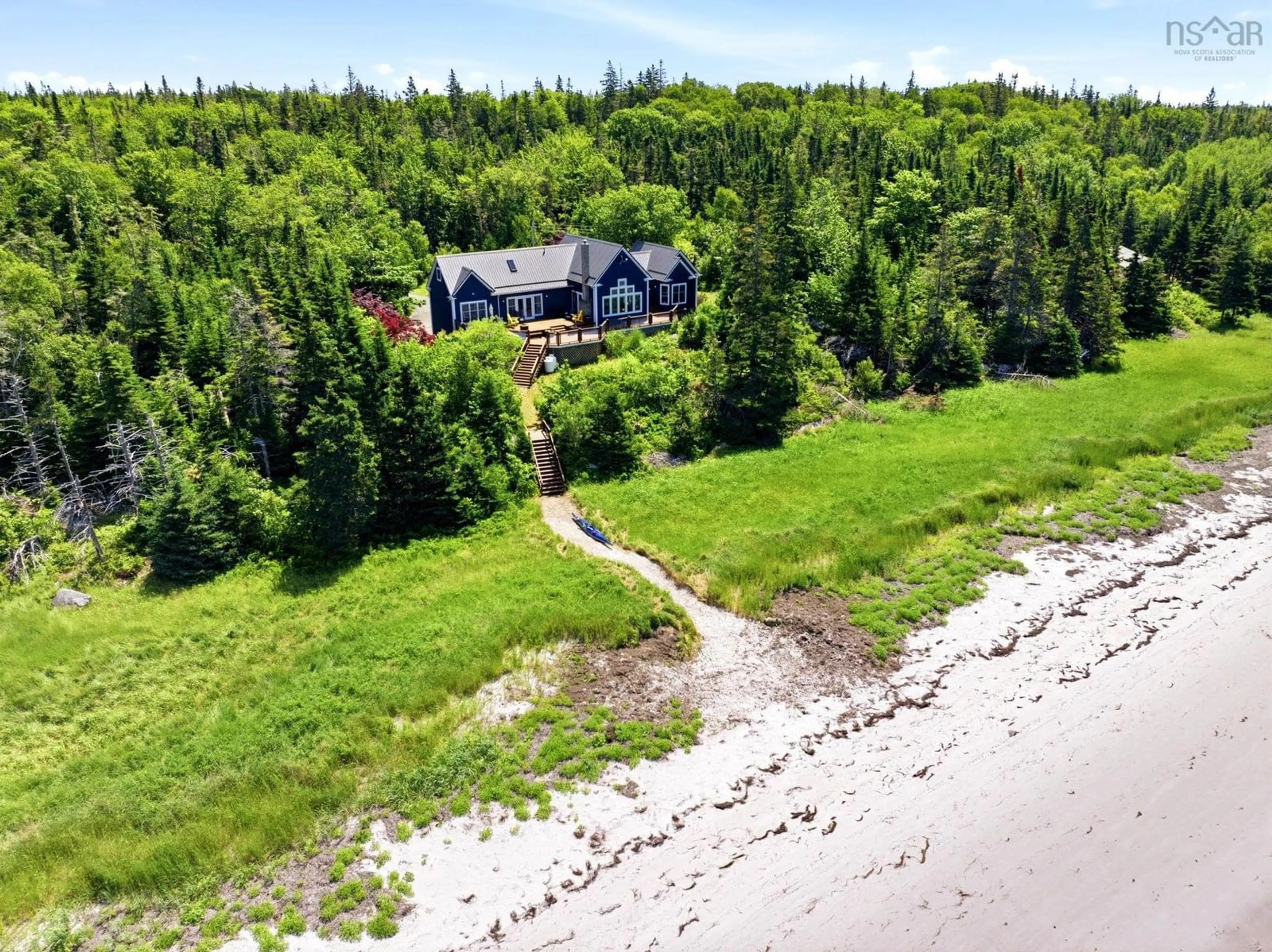 A pic from outside/outdoor area/front of a property/back of a property/a pic from drone, water/lake/river/ocean view for 900 Saint Catherines River Rd, Port Joli Nova Scotia B0T 1S0