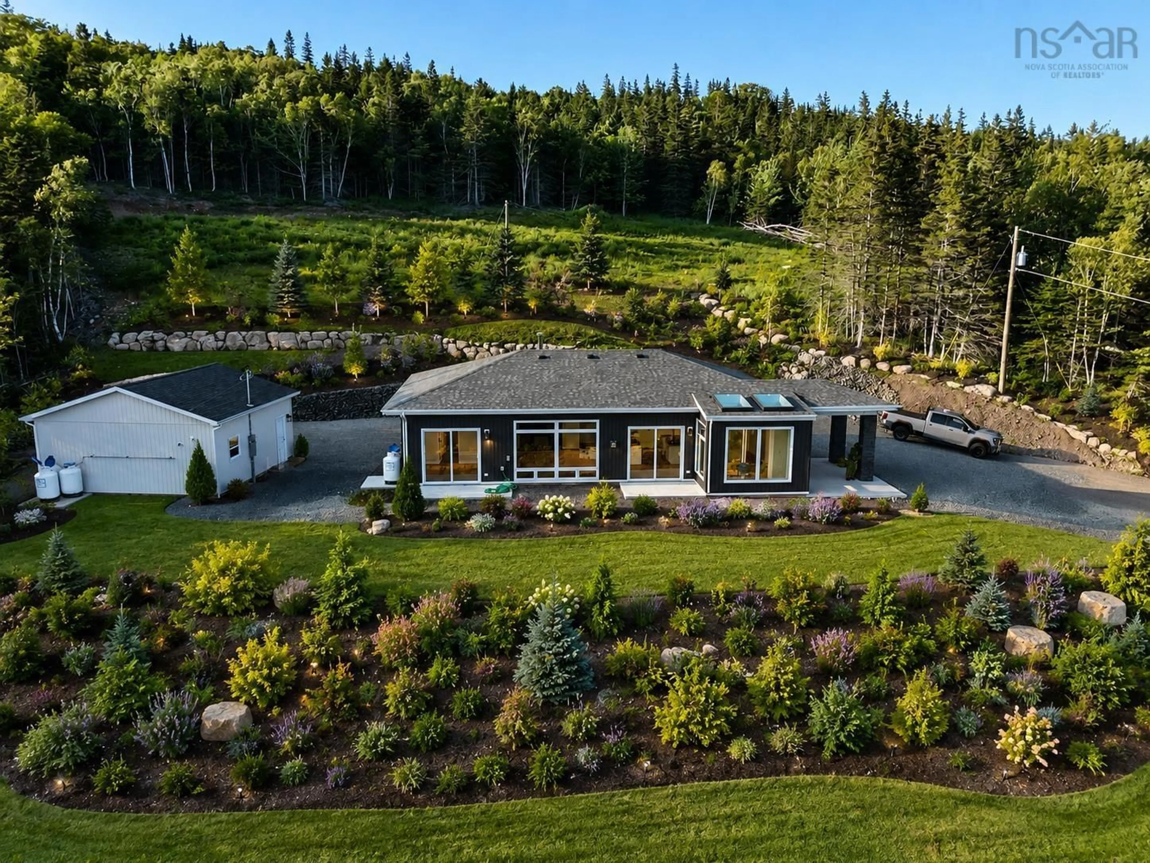 A pic from outside/outdoor area/front of a property/back of a property/a pic from drone, mountain view for 3352 Eskasoni Road, Islandview Nova Scotia B1J 1K3