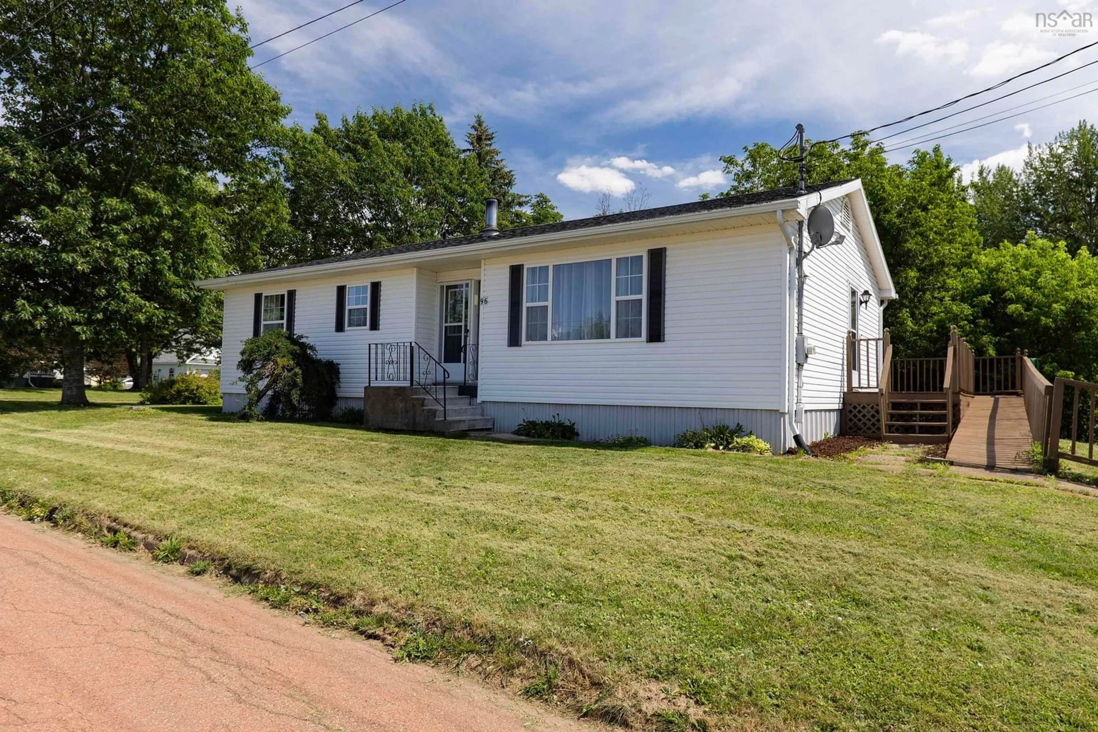 Home with vinyl exterior material, street for 96 Queen St, Pugwash Nova Scotia B0K 1L0