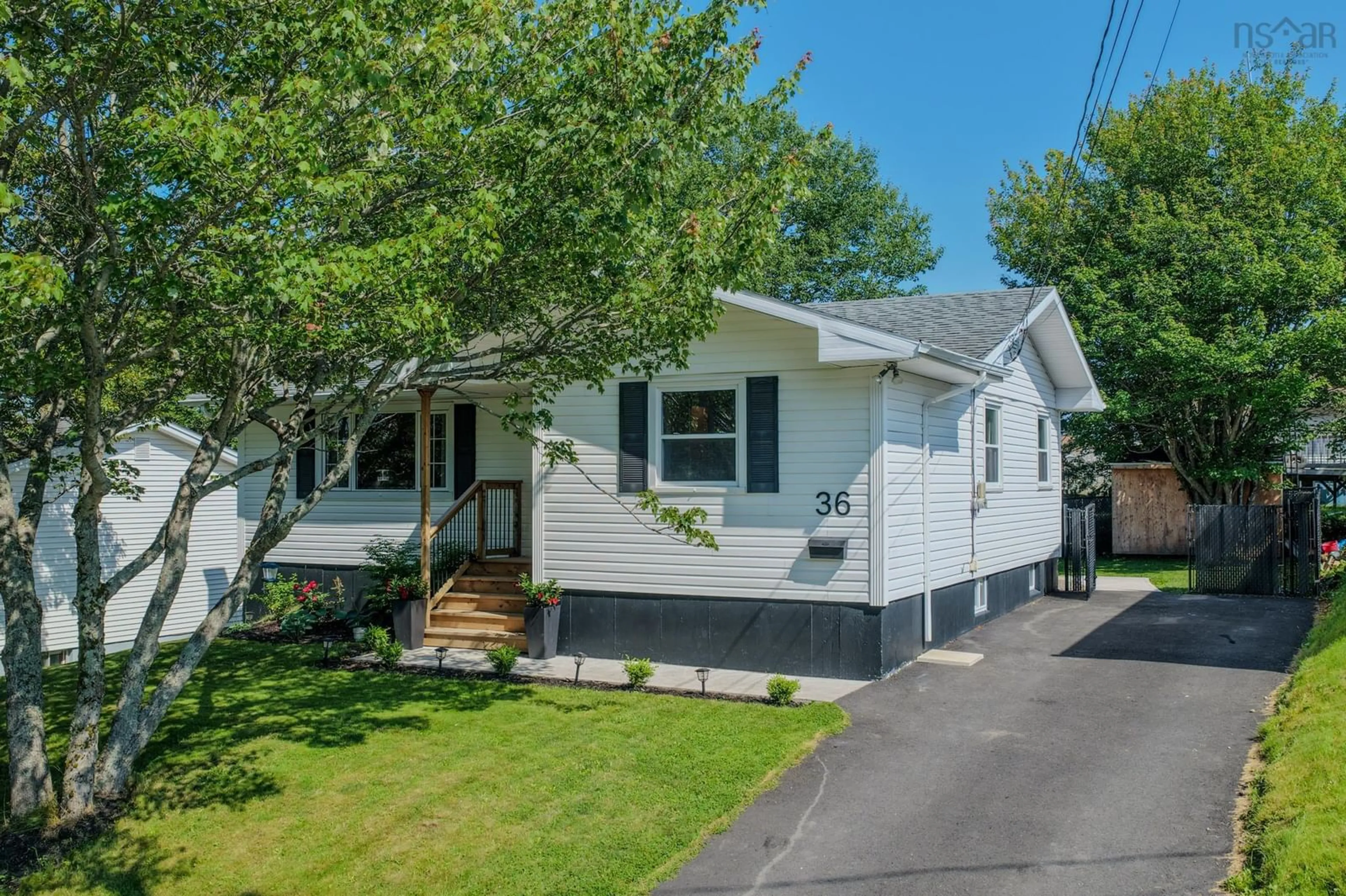 Home with vinyl exterior material, street for 36 Common St, Sydney Nova Scotia B1P 3L1