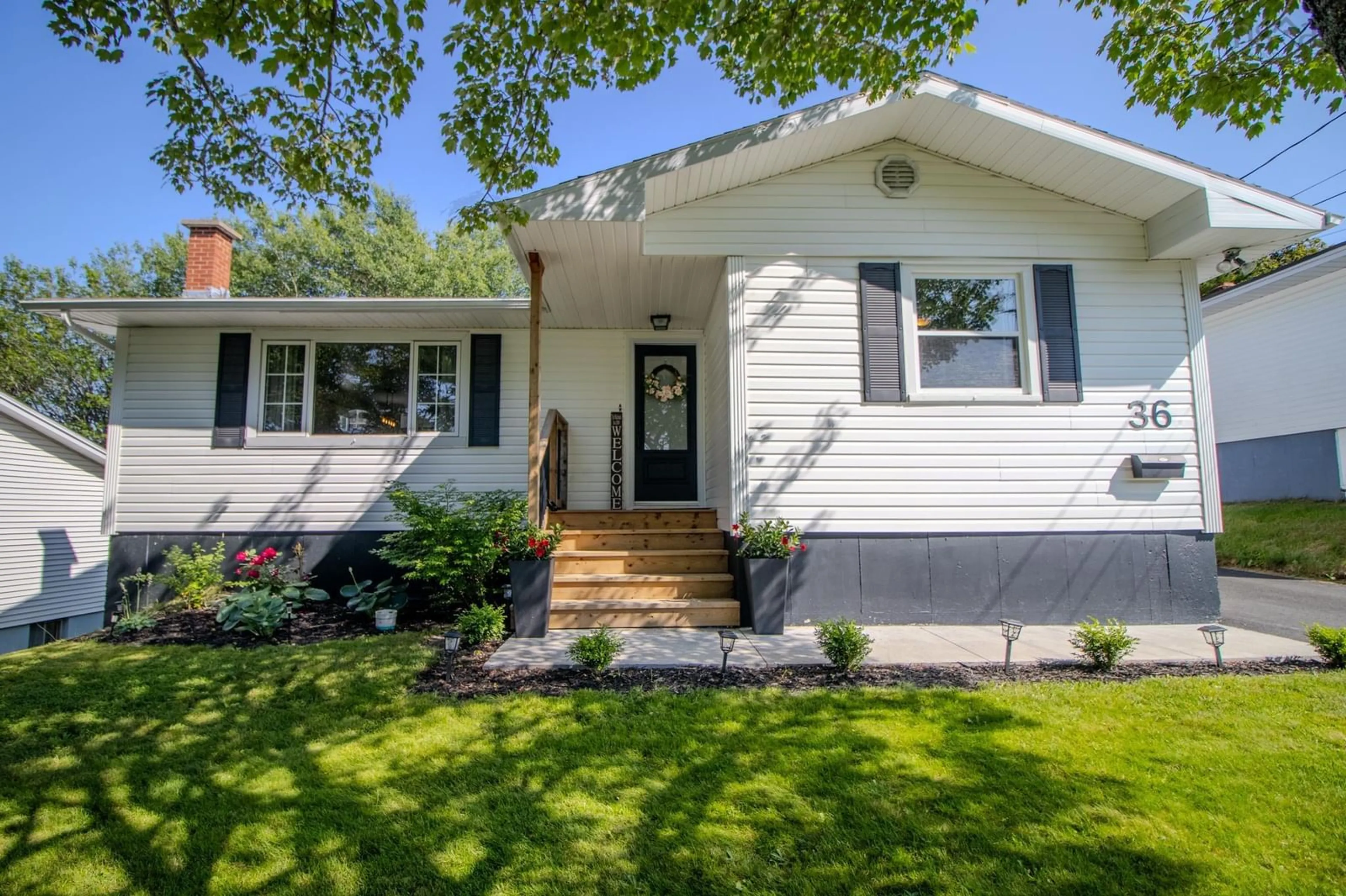 Home with vinyl exterior material, street for 36 Common St, Sydney Nova Scotia B1P 3L1