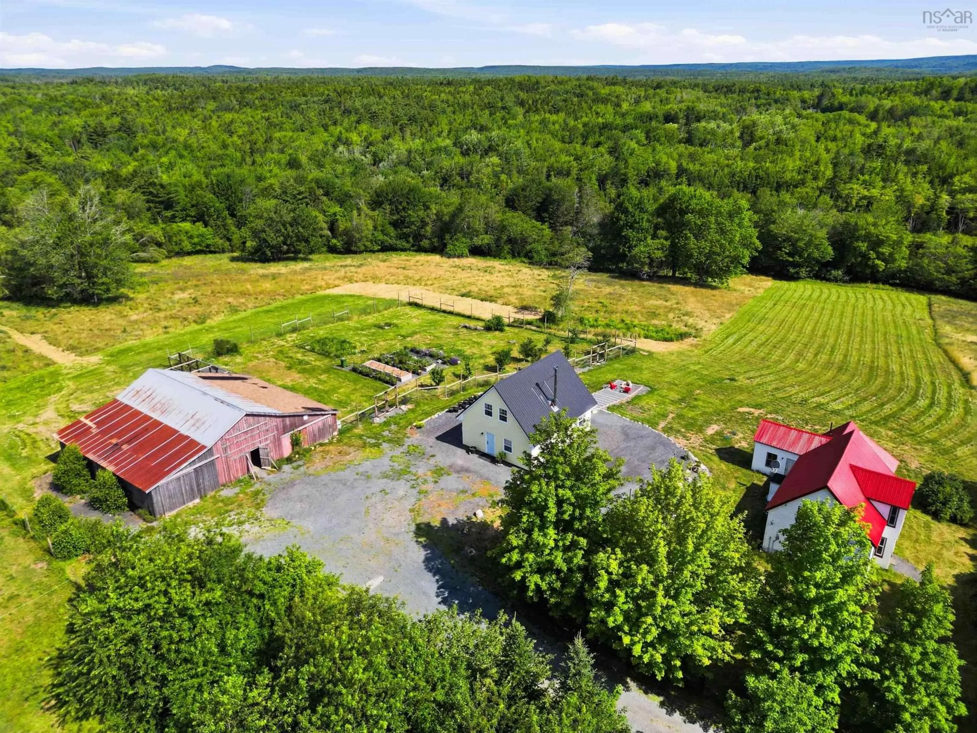 A pic from outside/outdoor area/front of a property/back of a property/a pic from drone, mountain view for 1368 Highway 208, Simpsons Corner Nova Scotia B0R 1E0