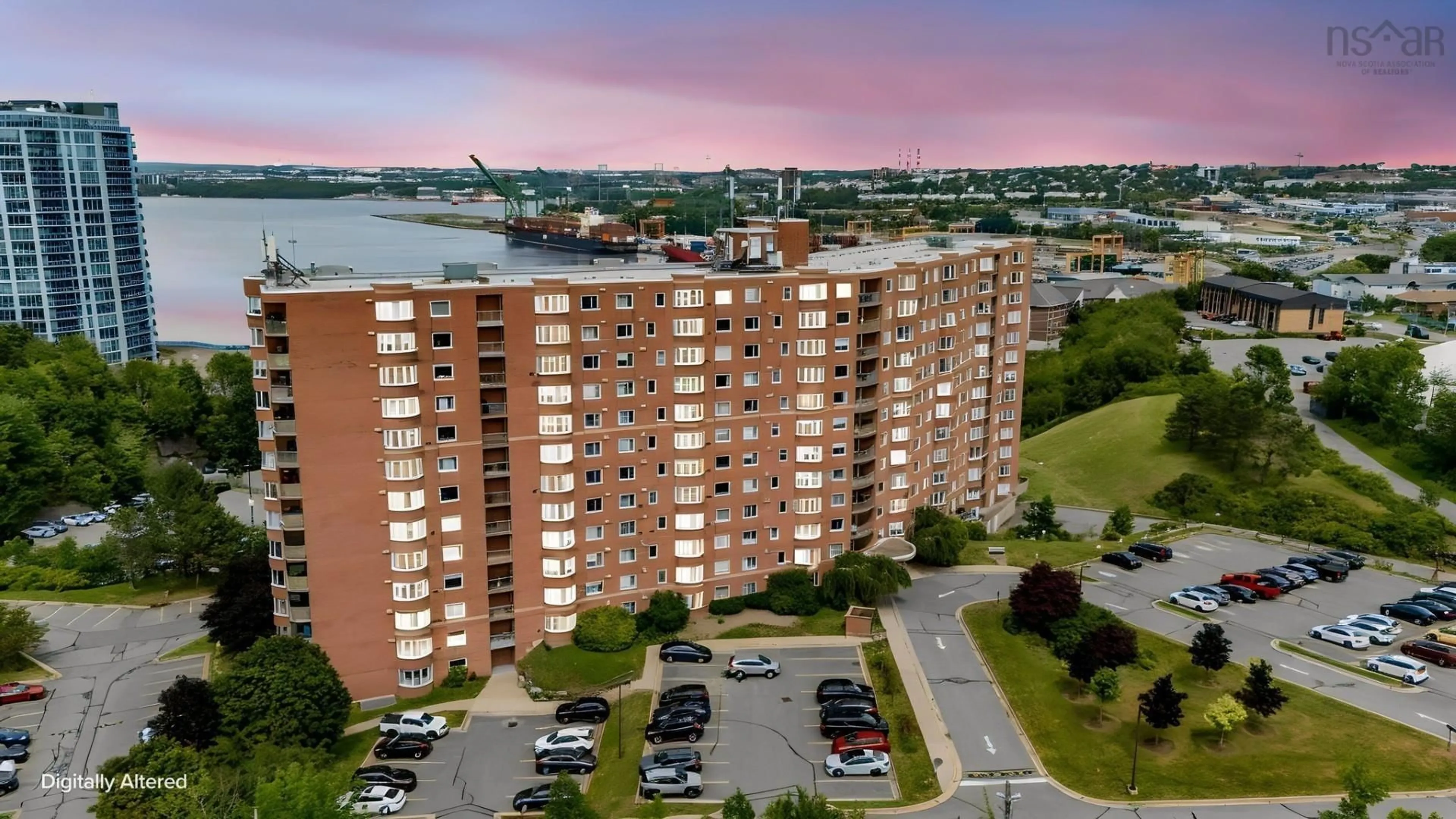 A pic from outside/outdoor area/front of a property/back of a property/a pic from drone, city buildings view from balcony for 45 Vimy Ave #325, Halifax Nova Scotia B3M 4C5