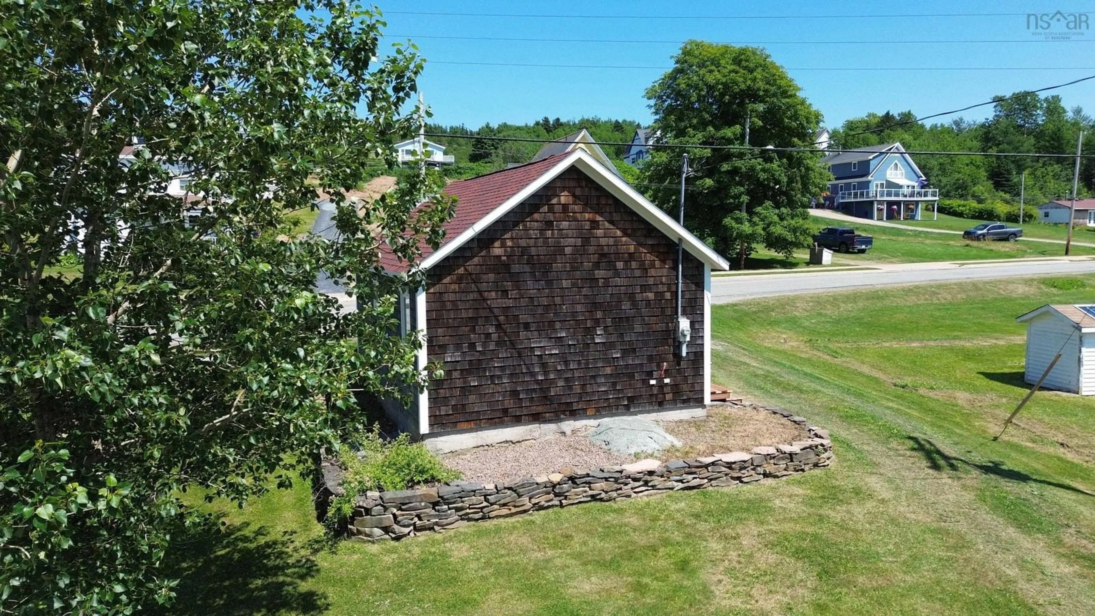 A pic from outside/outdoor area/front of a property/back of a property/a pic from drone, building for 20 High Rd, Port Hood Nova Scotia B0E 2W0