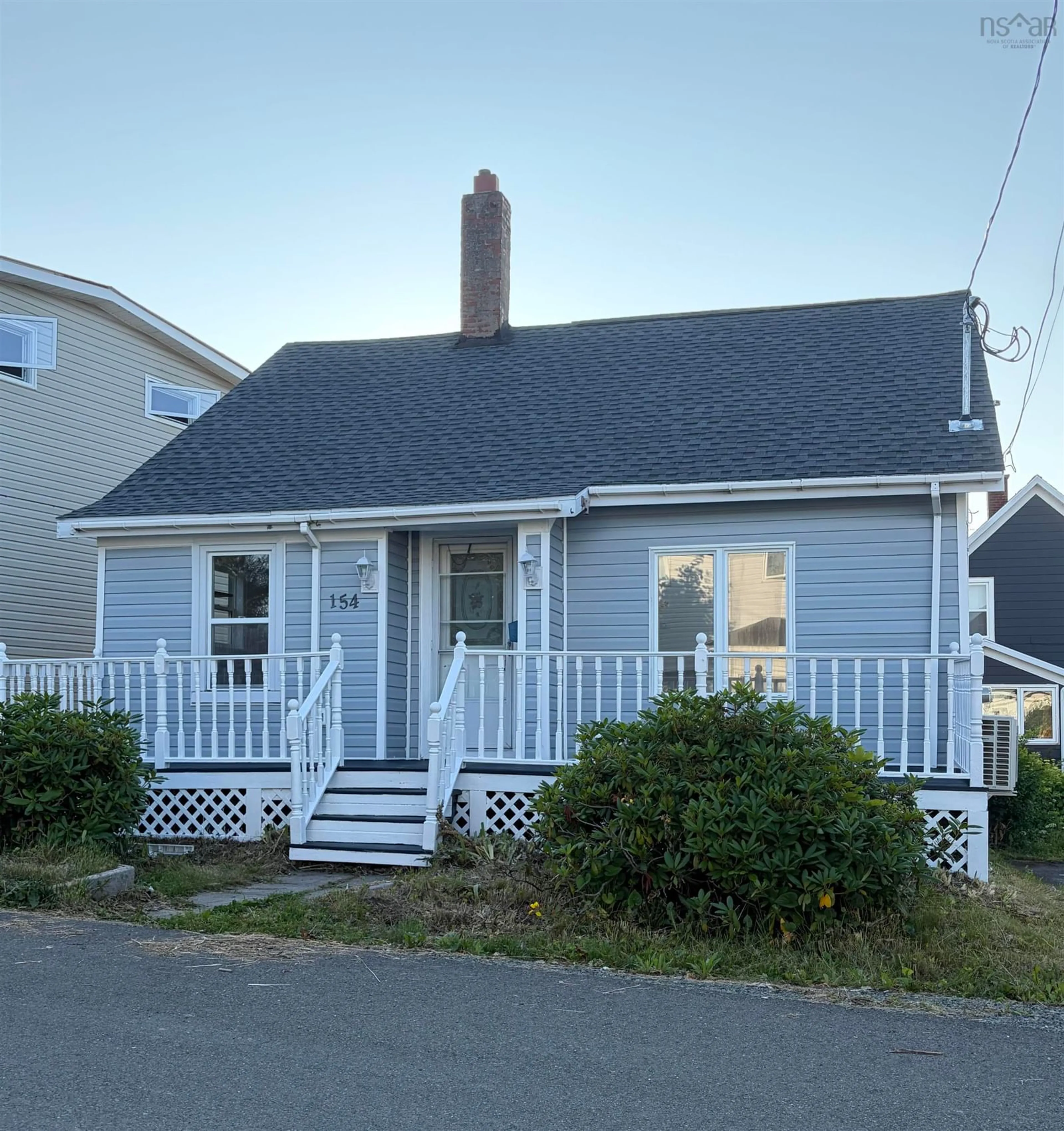 Home with vinyl exterior material, street for 154 Cottage St, Glace Bay Nova Scotia B1A 3T6