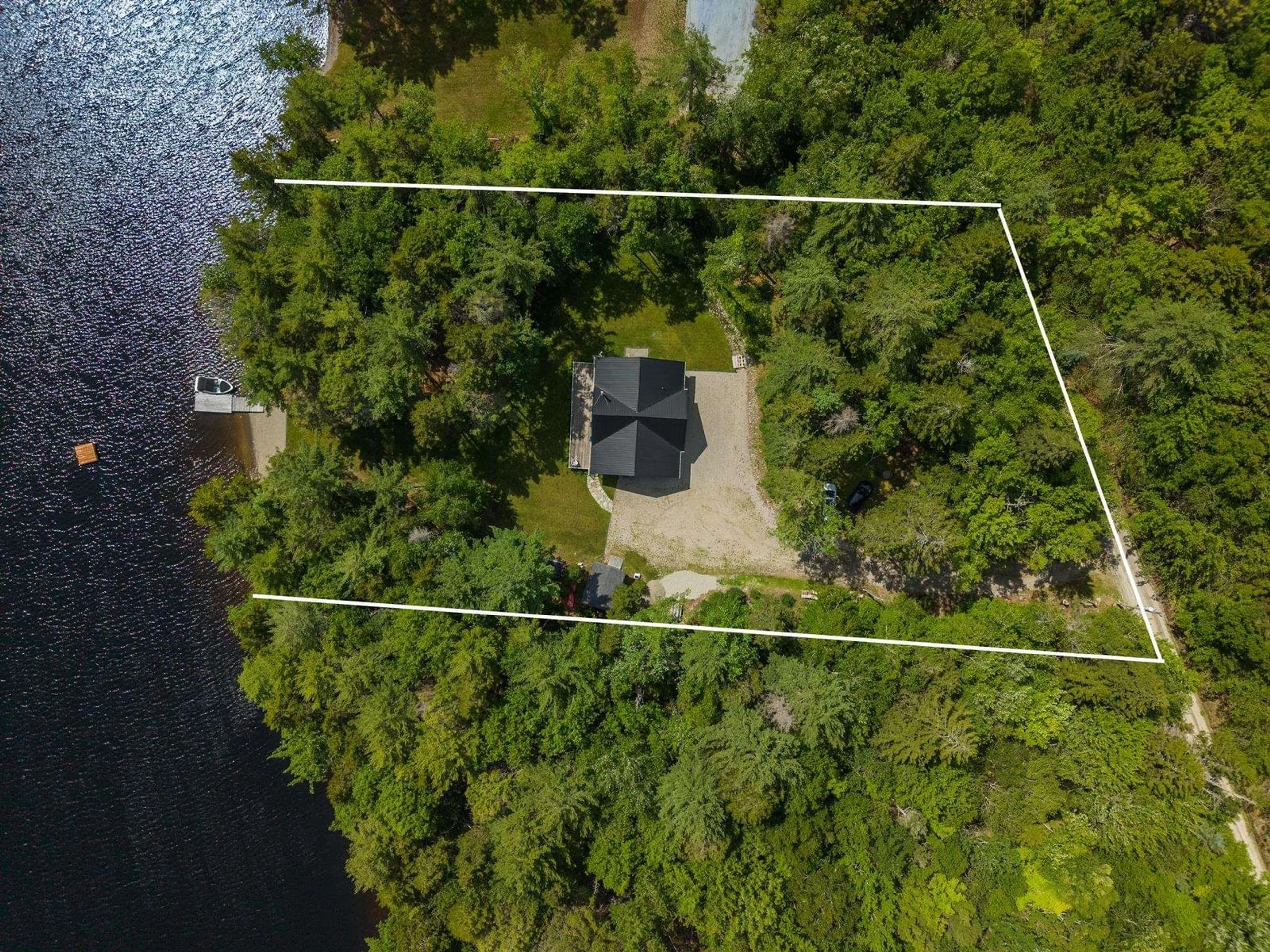 A pic from outside/outdoor area/front of a property/back of a property/a pic from drone, water/lake/river/ocean view for 120 Kempt Back Lake Rd, Kemptville Nova Scotia B5A 5X9
