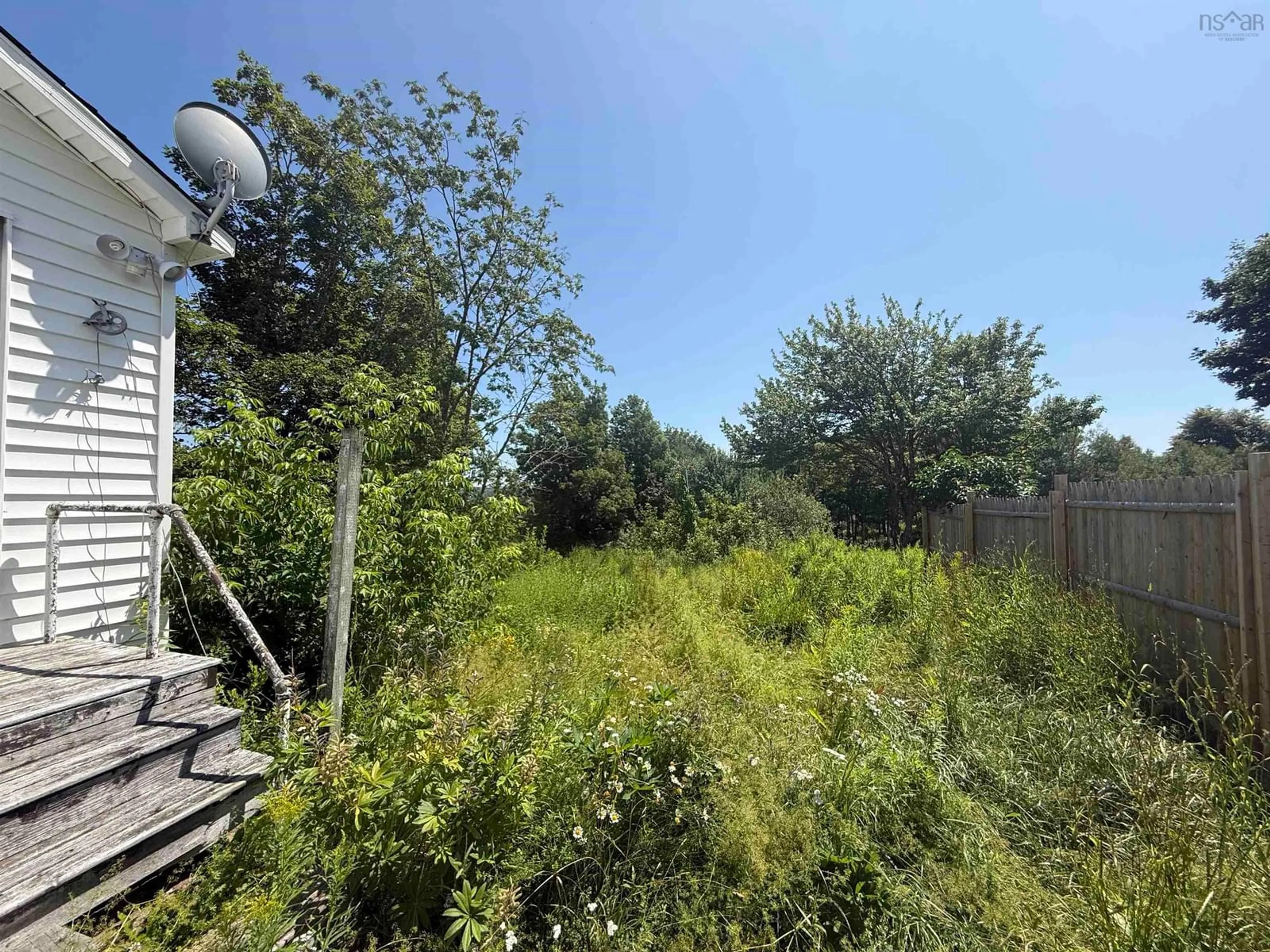 A pic from outside/outdoor area/front of a property/back of a property/a pic from drone, forest/trees view for 33 South St, Springhill Nova Scotia B0M 1X0