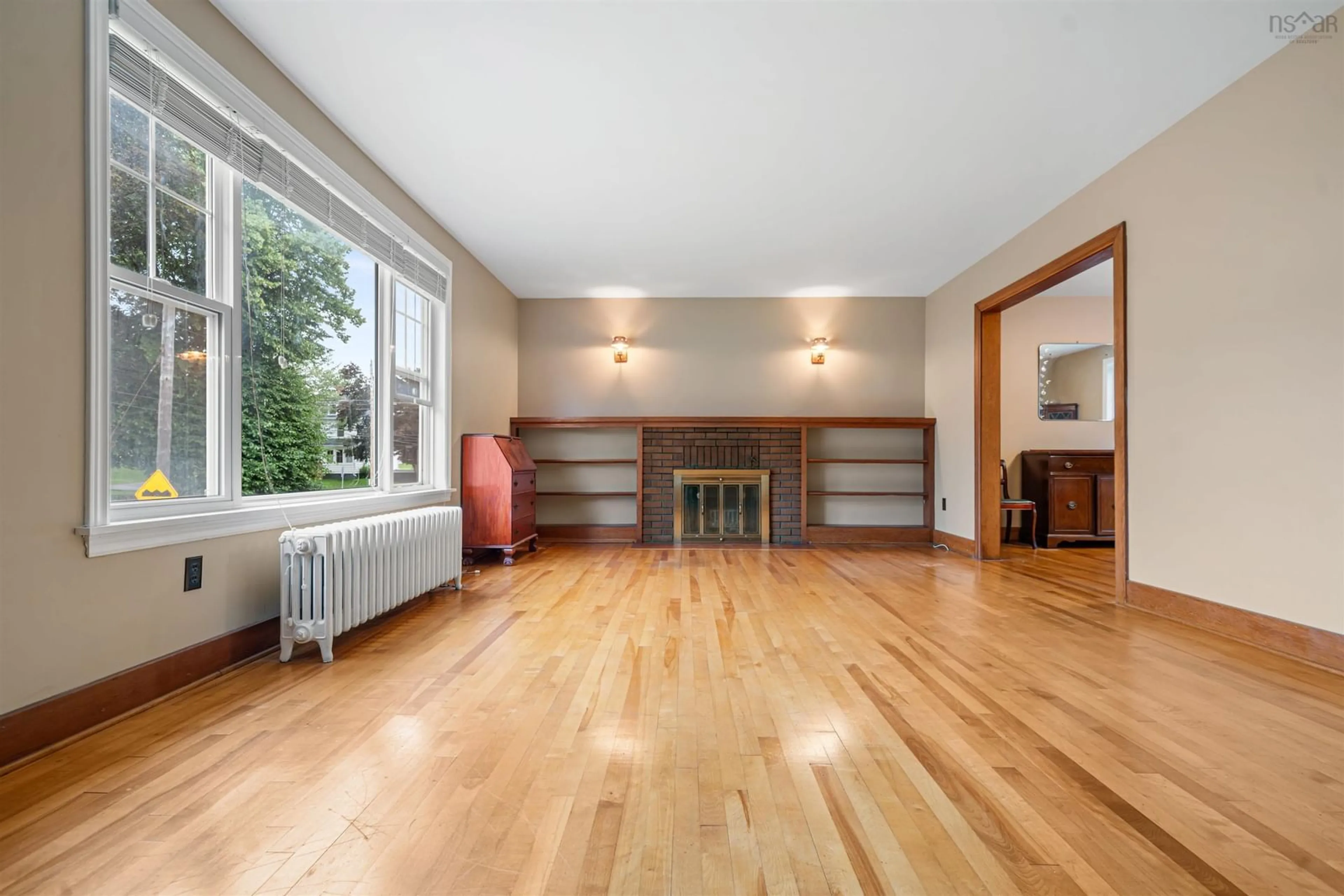 Living room with furniture, wood/laminate floor for 151 Sanborne St, New Glasgow Nova Scotia B2H 1E9