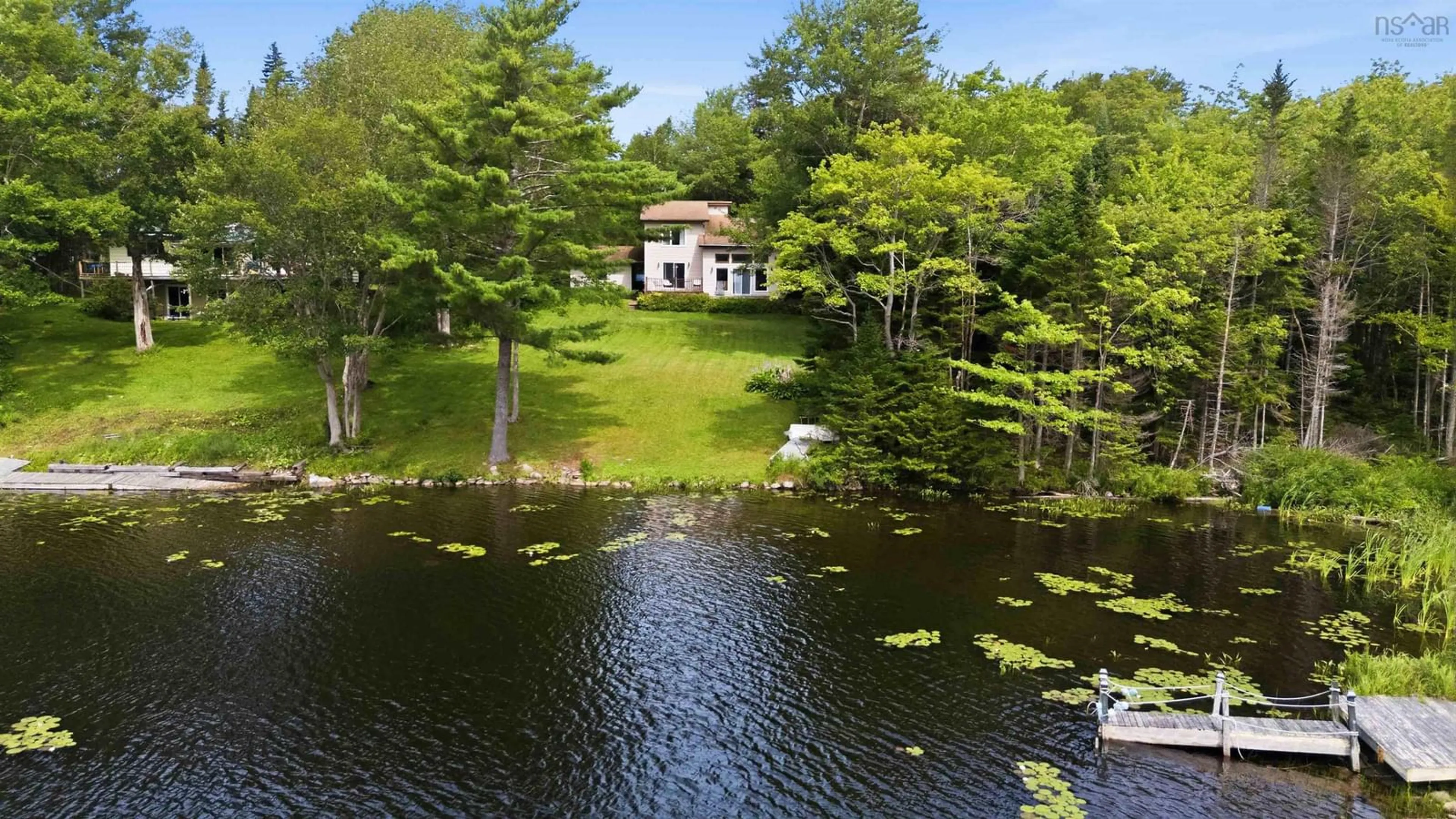 A pic from outside/outdoor area/front of a property/back of a property/a pic from drone, water/lake/river/ocean view for 85 Woodland Park, East Uniacke Nova Scotia B0N 1Z0
