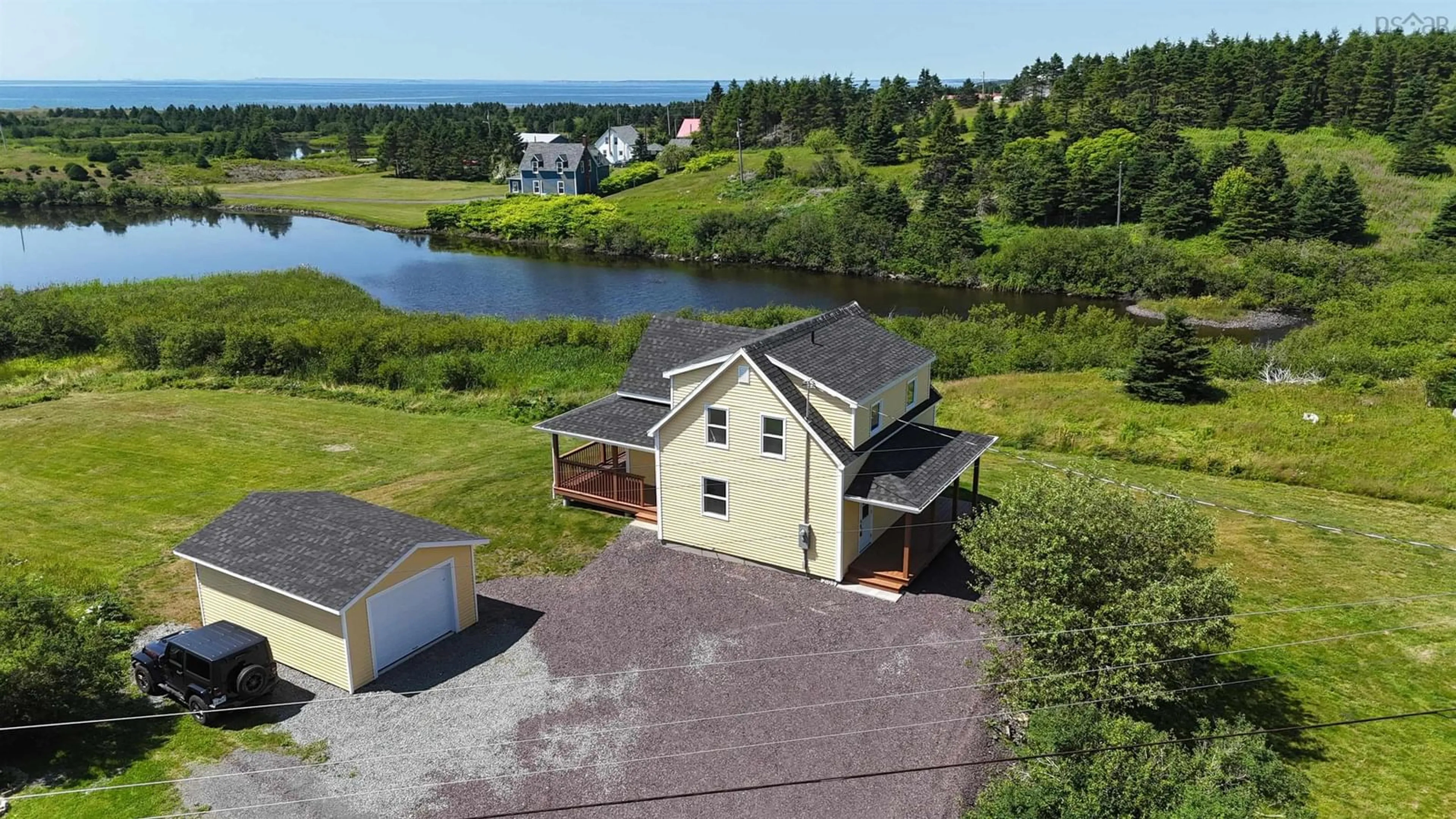A pic from outside/outdoor area/front of a property/back of a property/a pic from drone, water/lake/river/ocean view for 2108 Highway 247, L'Ardoise Nova Scotia B0E 1S0