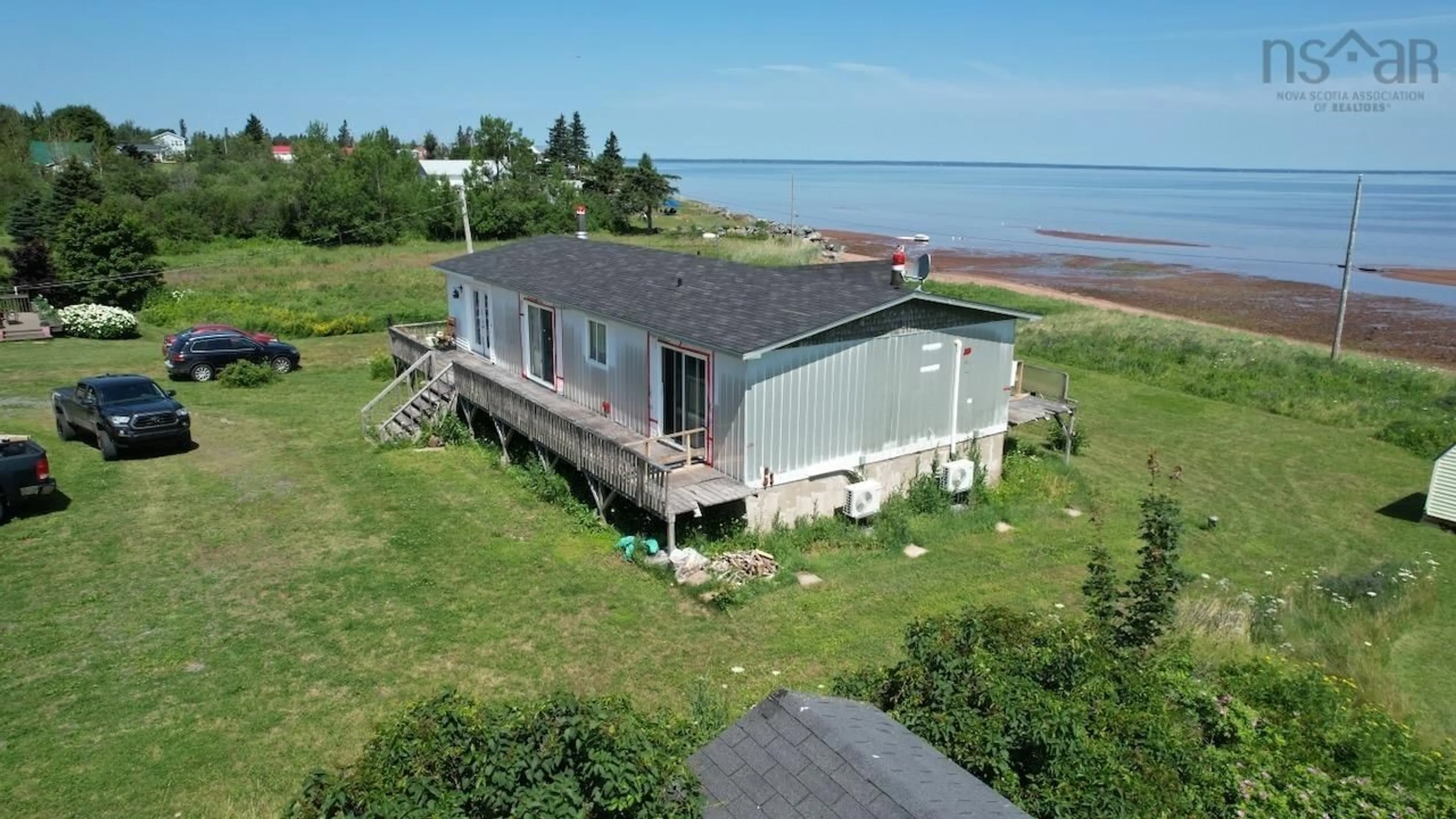A pic from outside/outdoor area/front of a property/back of a property/a pic from drone, water/lake/river/ocean view for 19 Rockwell Lane, Amherst Shore Nova Scotia B0L 1E0
