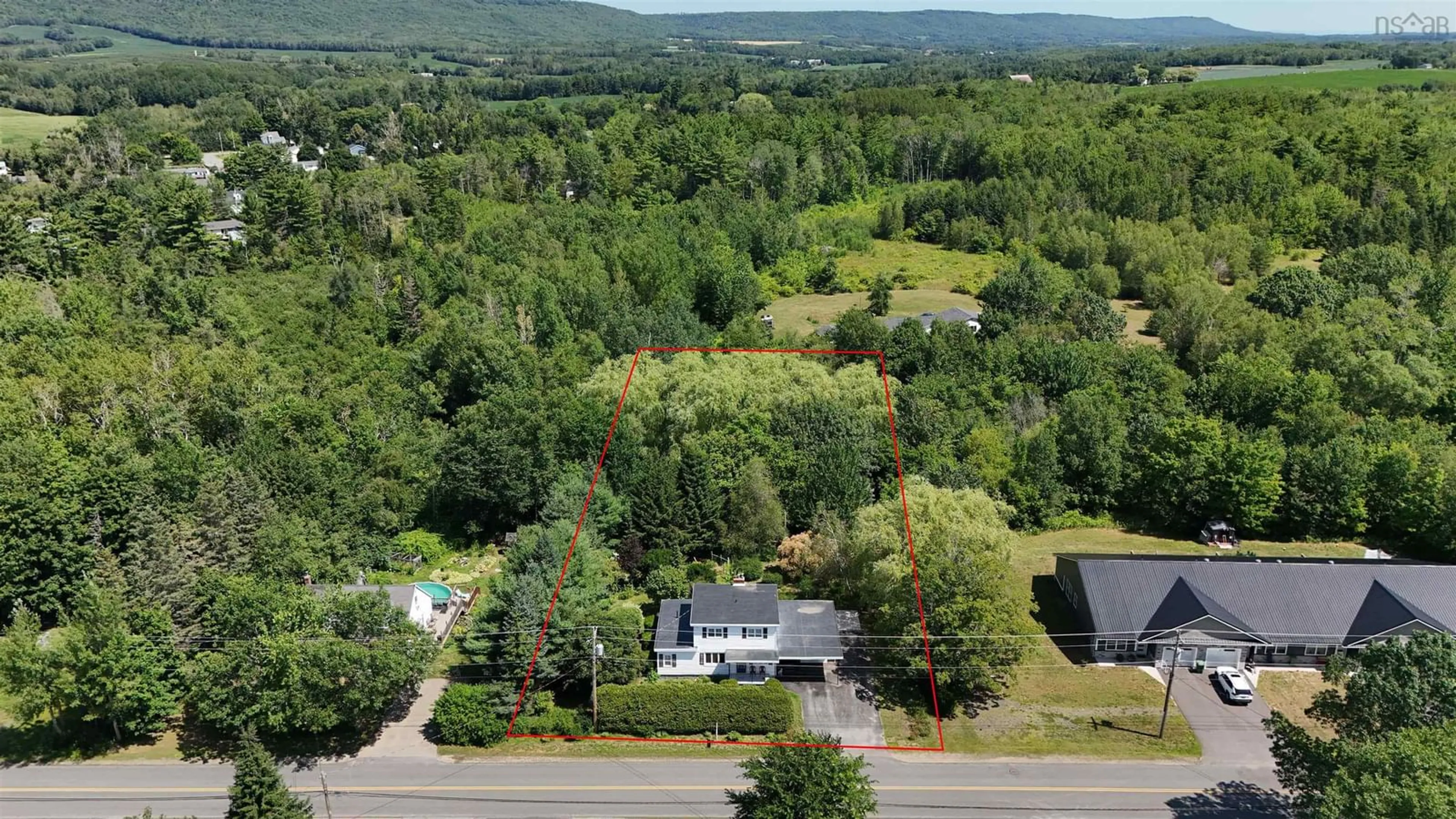 A pic from outside/outdoor area/front of a property/back of a property/a pic from drone, mountain view for 973 Sherman Belcher Rd, Centreville Nova Scotia B0P 1J0