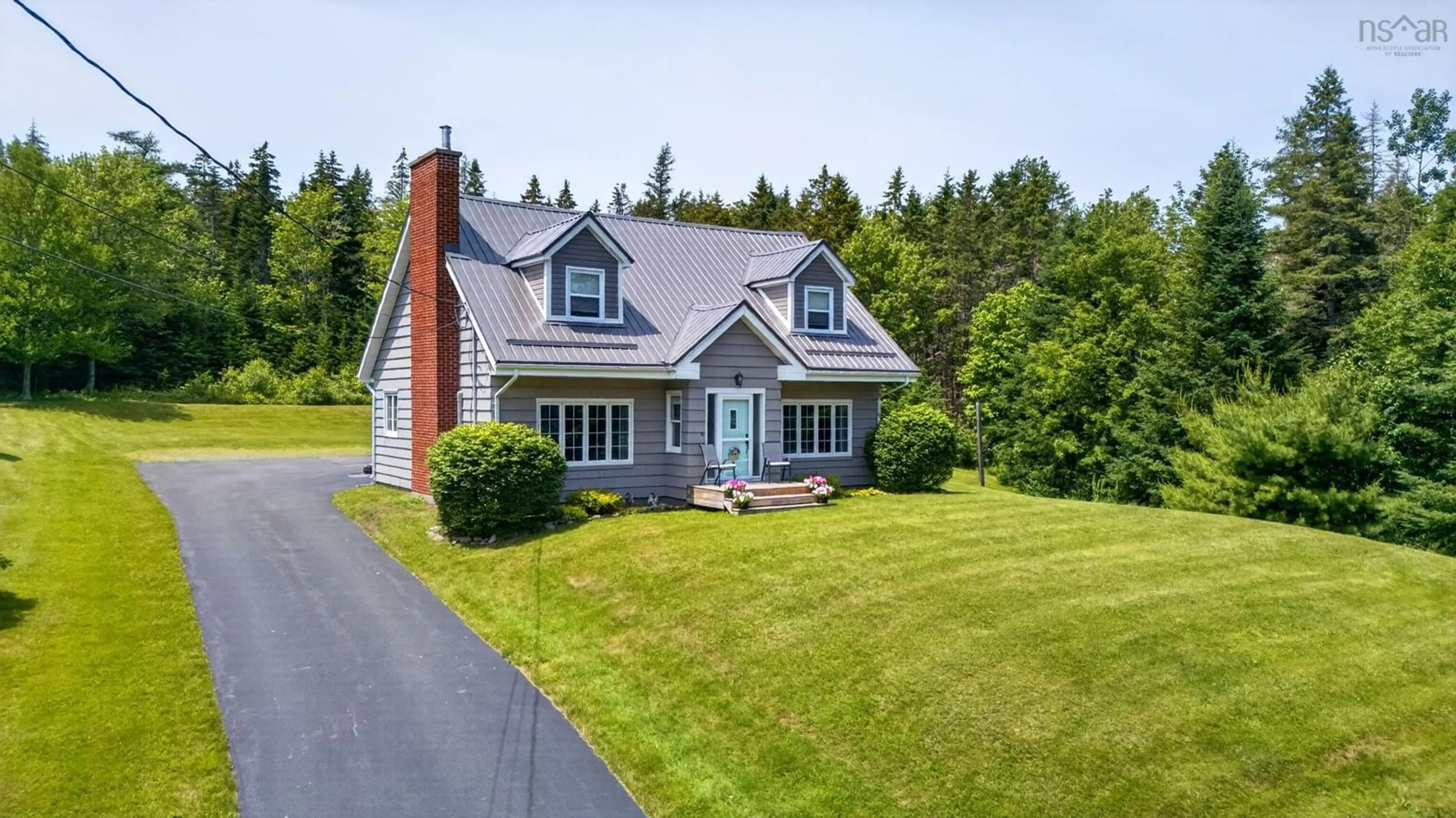 A pic from outside/outdoor area/front of a property/back of a property/a pic from drone, street for 60 Lower Harmony Rd, Harmony Nova Scotia B6L 3V6