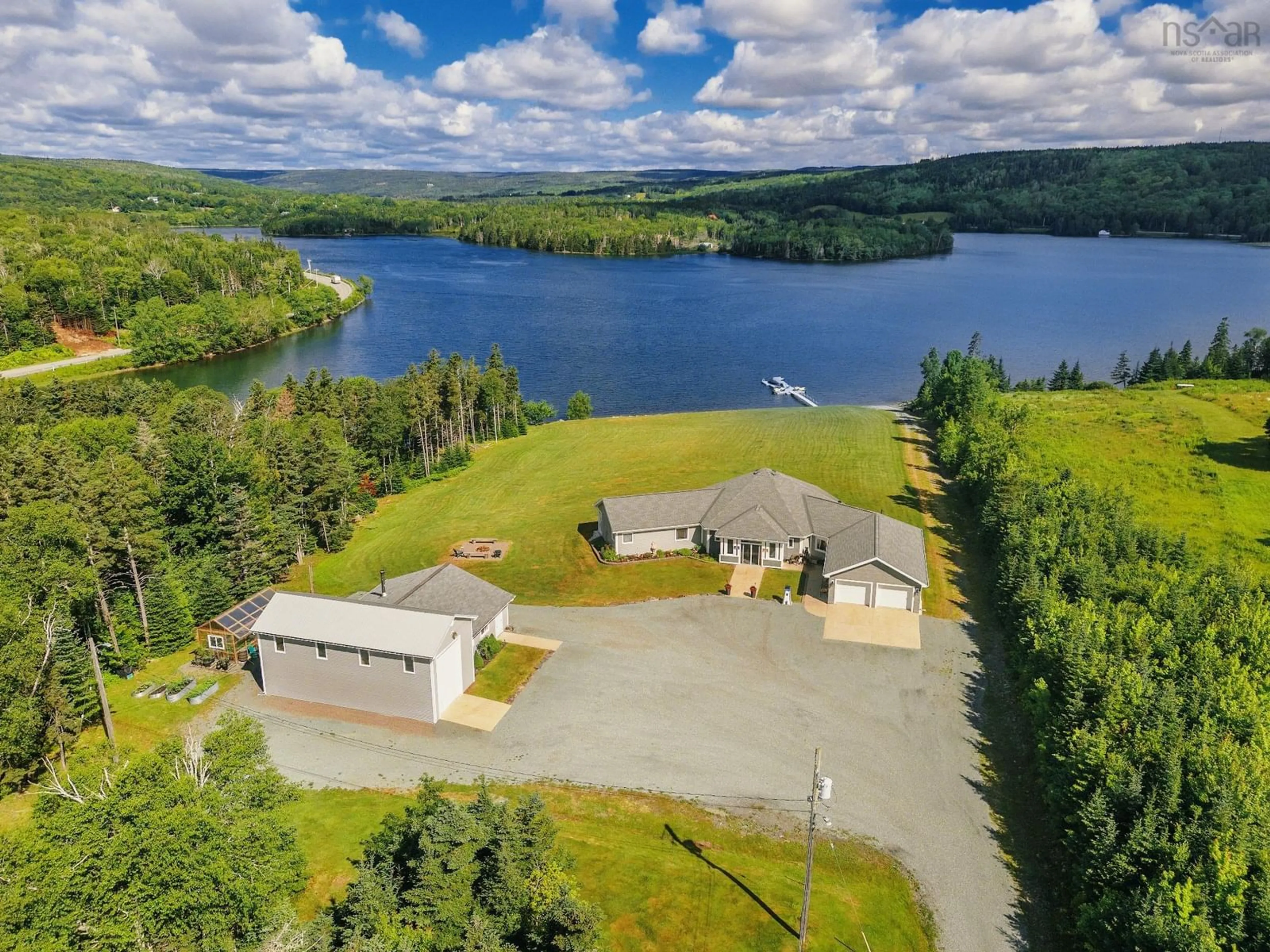 A pic from outside/outdoor area/front of a property/back of a property/a pic from drone, water/lake/river/ocean view for 11637 Highway 16, Boylston Nova Scotia B0H 1G0