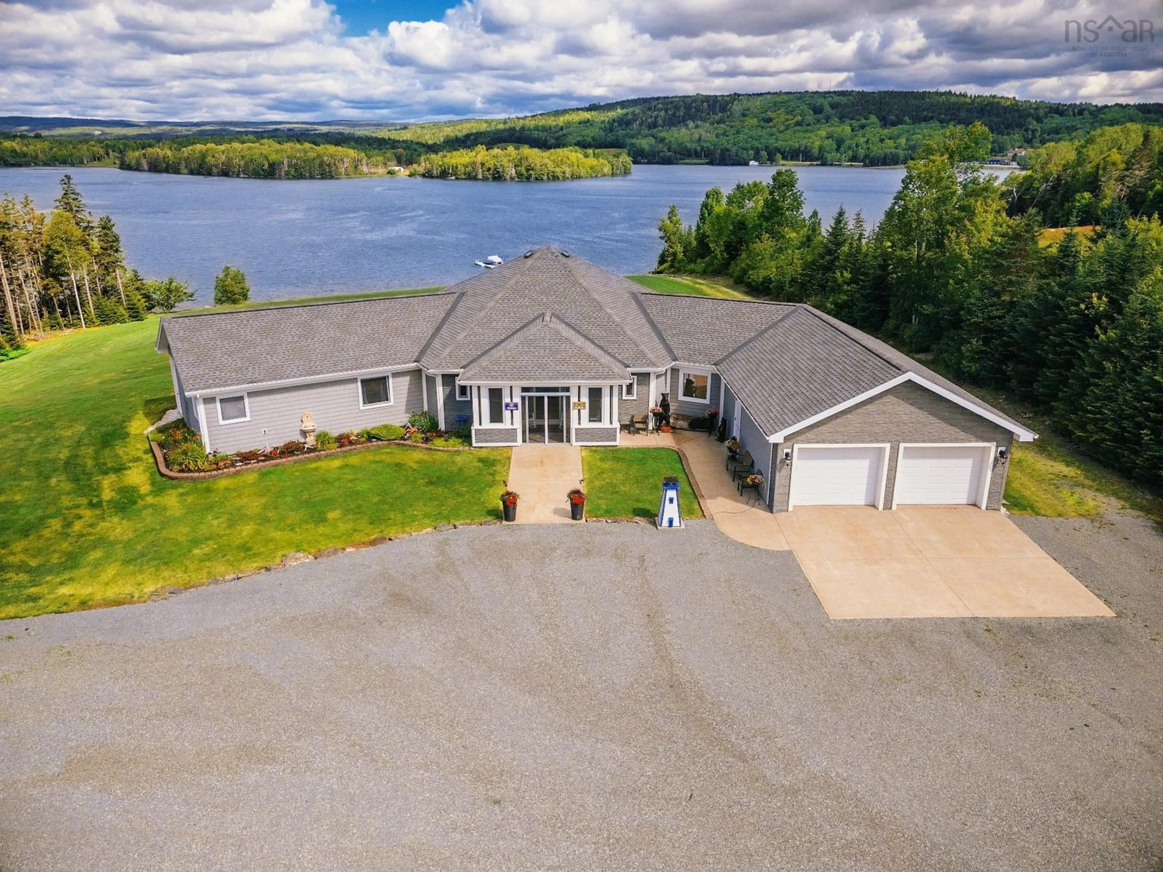 A pic from outside/outdoor area/front of a property/back of a property/a pic from drone, water/lake/river/ocean view for 11637 Highway 16, Boylston Nova Scotia B0H 1G0