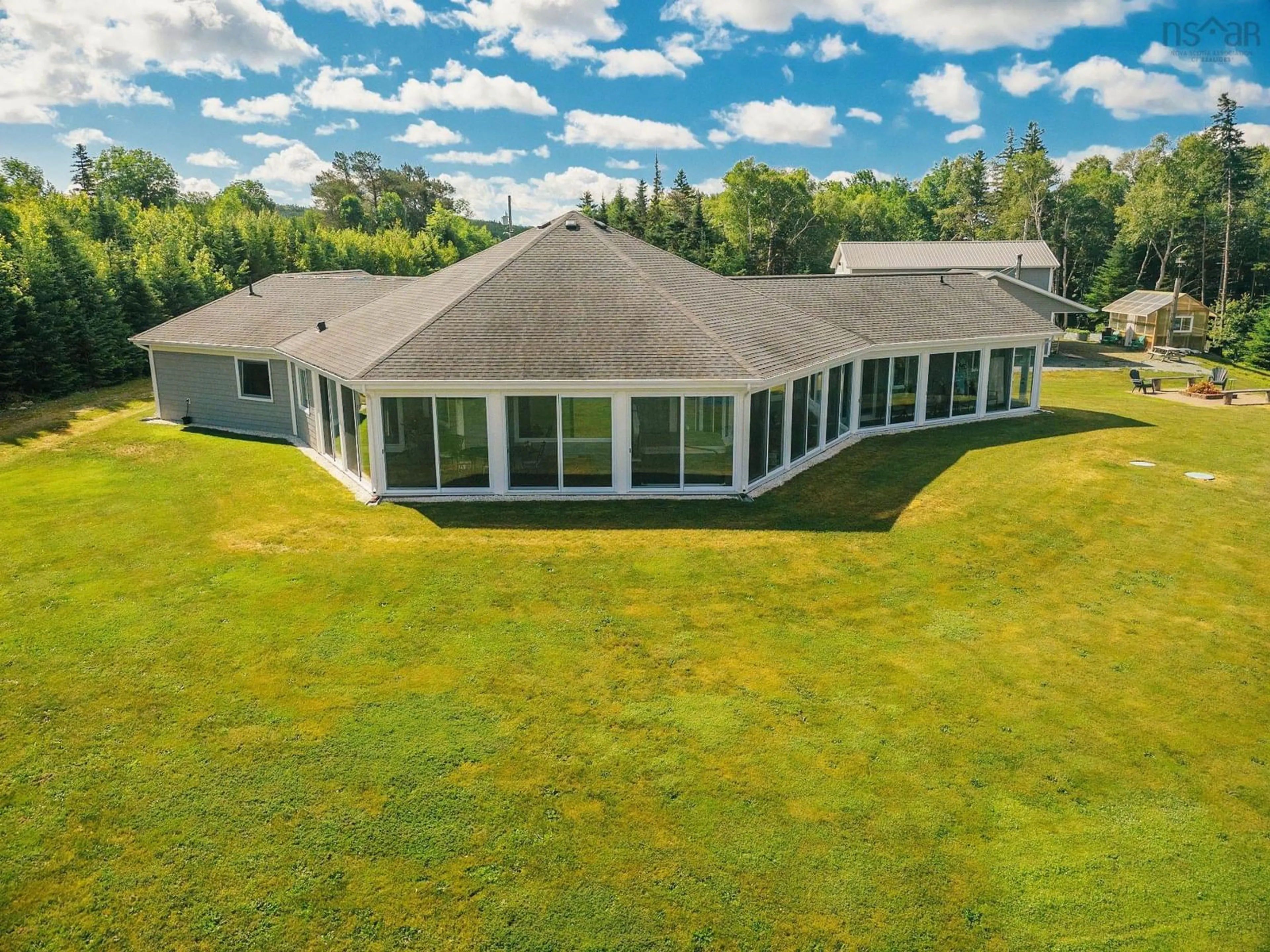 A pic from outside/outdoor area/front of a property/back of a property/a pic from drone, water/lake/river/ocean view for 11637 Highway 16, Boylston Nova Scotia B0H 1G0