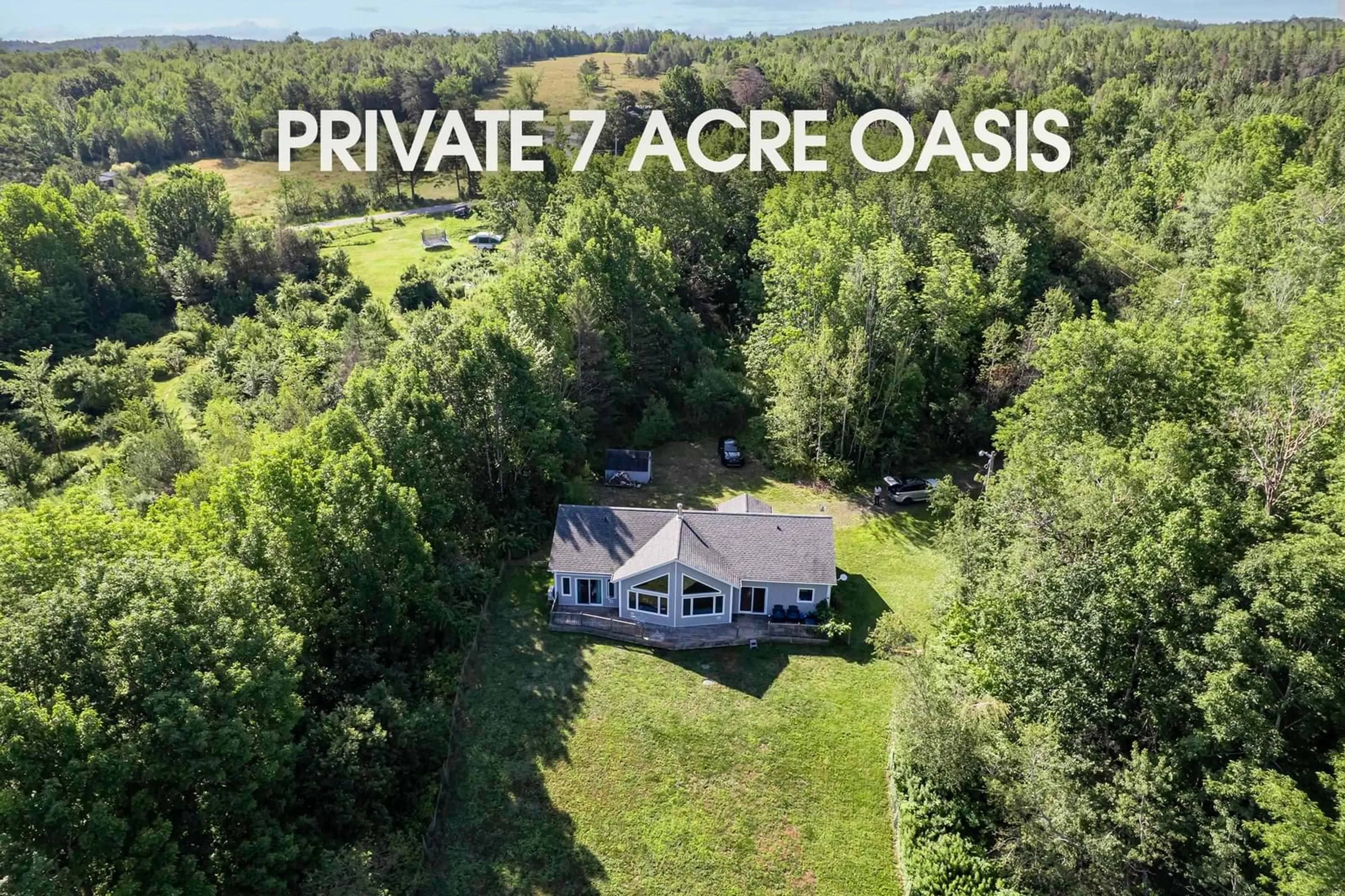 A pic from outside/outdoor area/front of a property/back of a property/a pic from drone, water/lake/river/ocean view for 7709 Highway 201, South Williamston Nova Scotia B0S 1M0