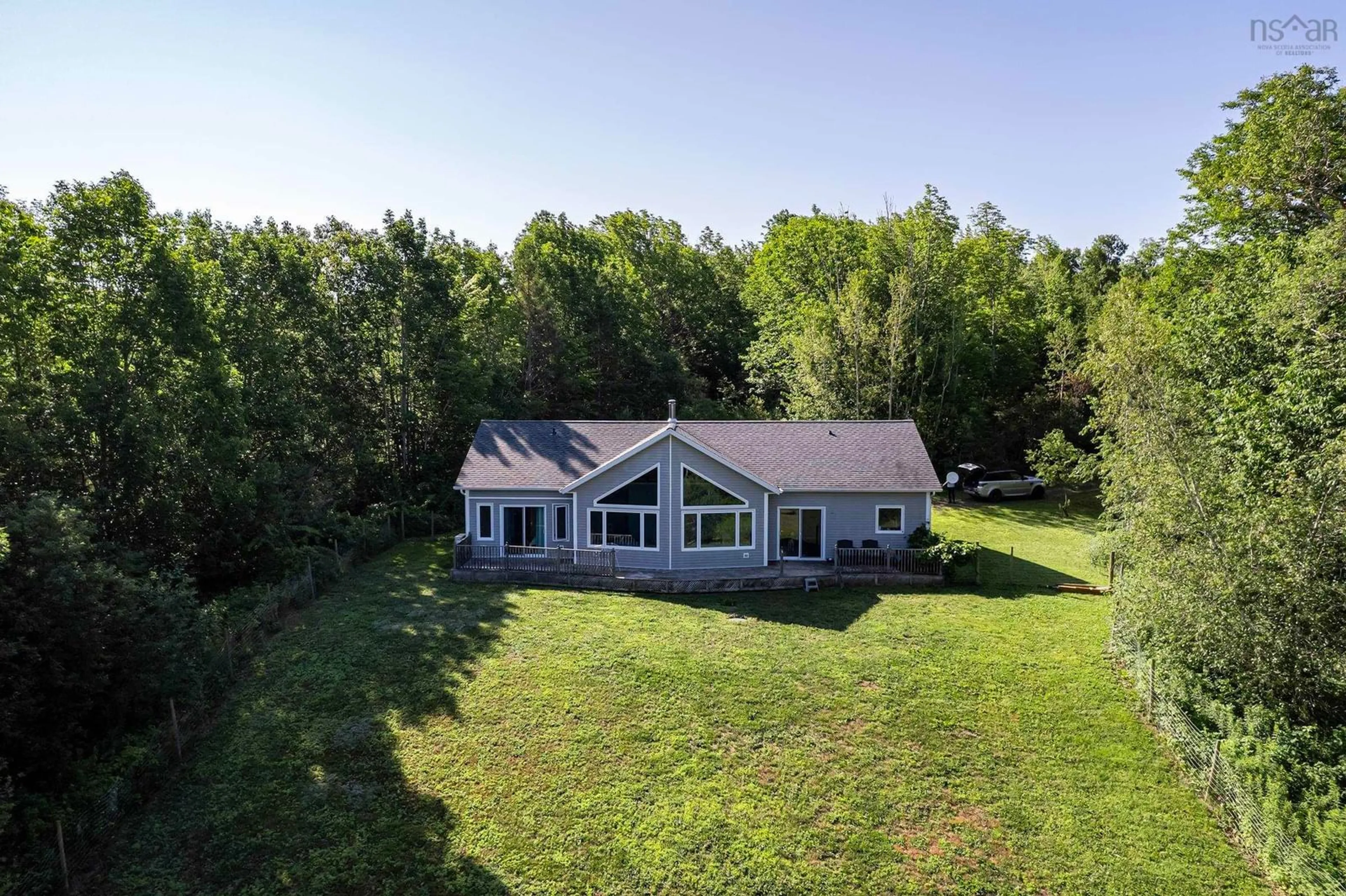 A pic from outside/outdoor area/front of a property/back of a property/a pic from drone, water/lake/river/ocean view for 7709 Highway 201, South Williamston Nova Scotia B0S 1M0