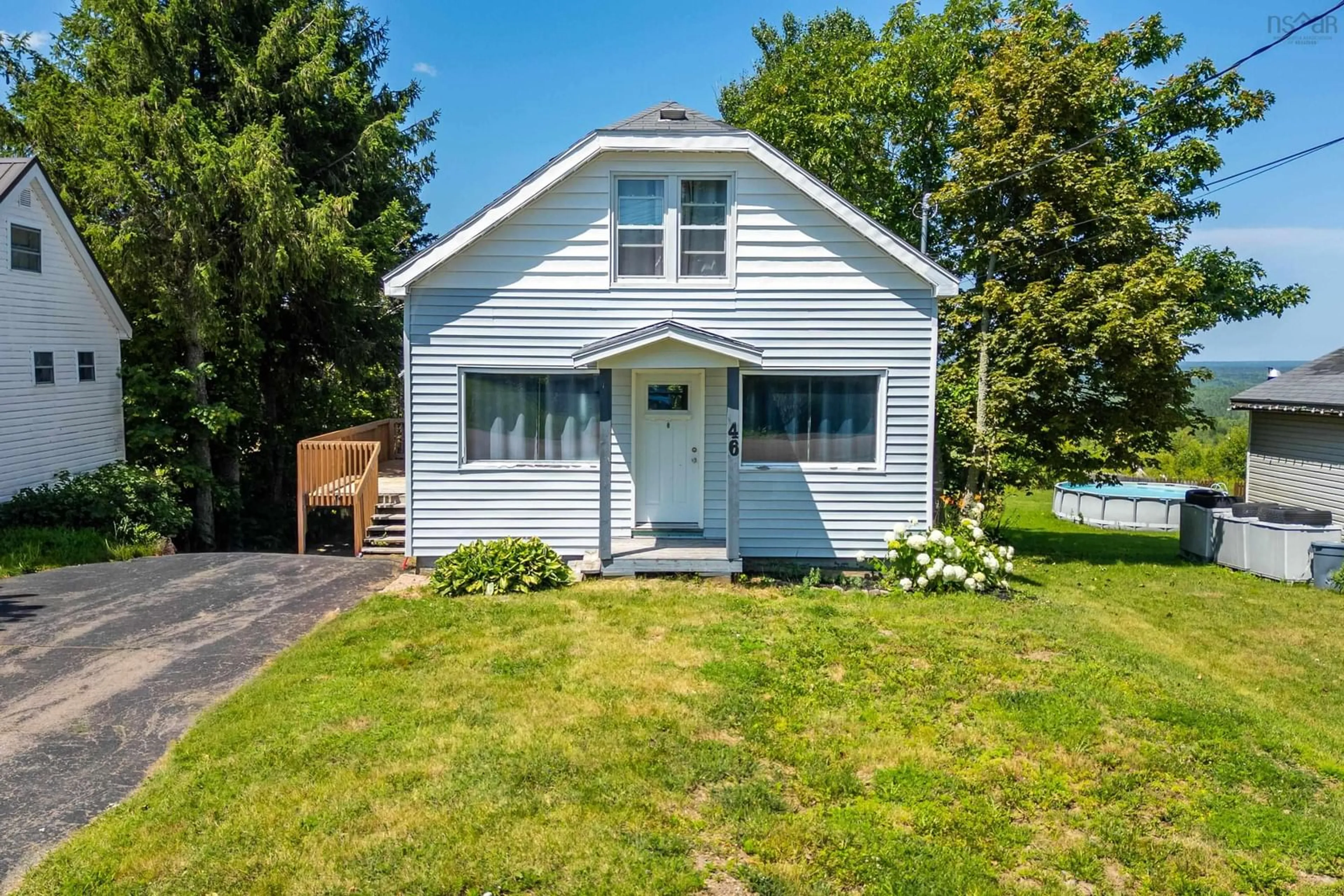 Home with vinyl exterior material, street for 46 Maple St, Springhill Nova Scotia B0M 1X0