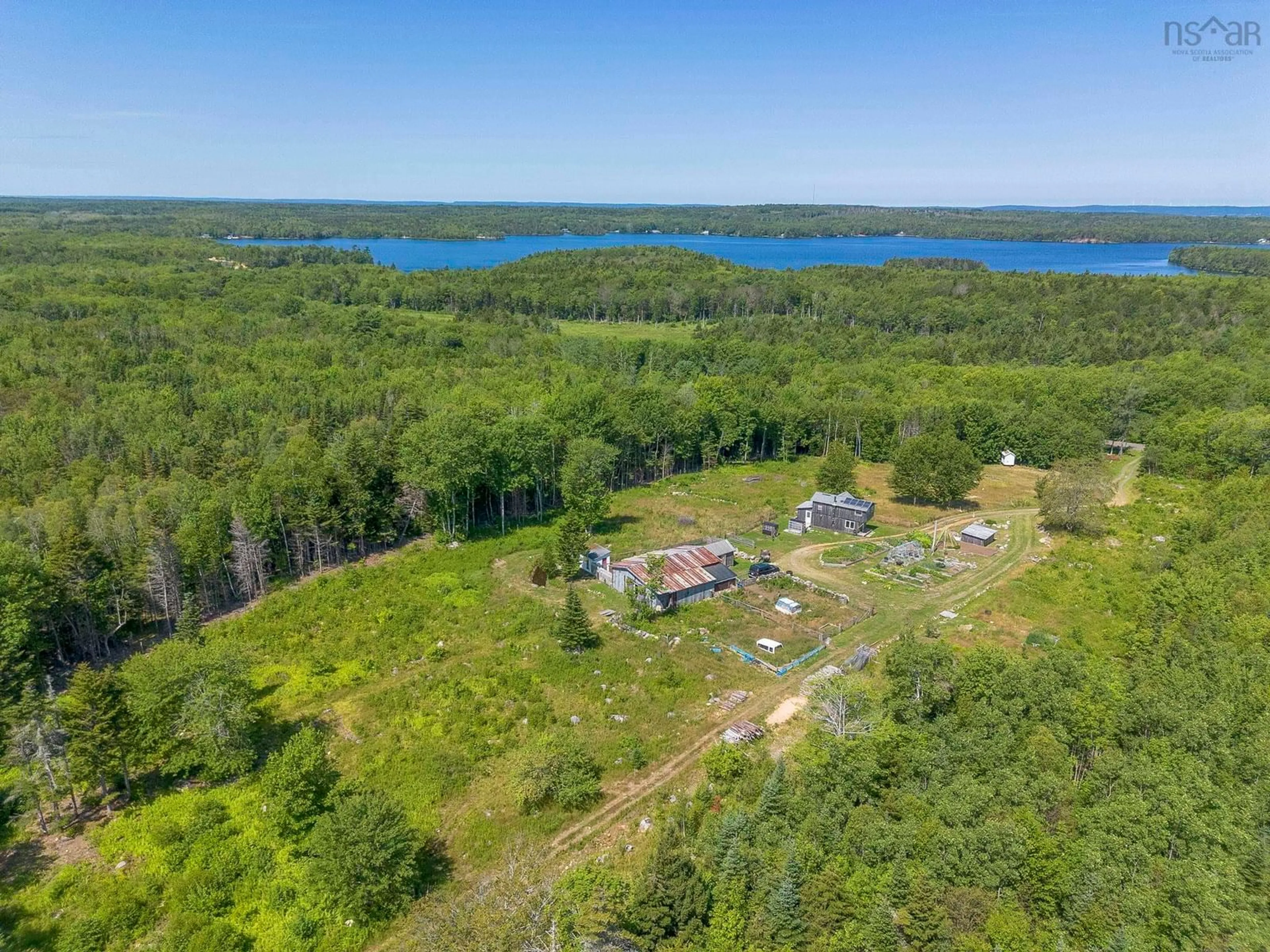 A pic from outside/outdoor area/front of a property/back of a property/a pic from drone, water/lake/river/ocean view for 3828 Sissiboo Rd, South Range Nova Scotia B0W 1H0