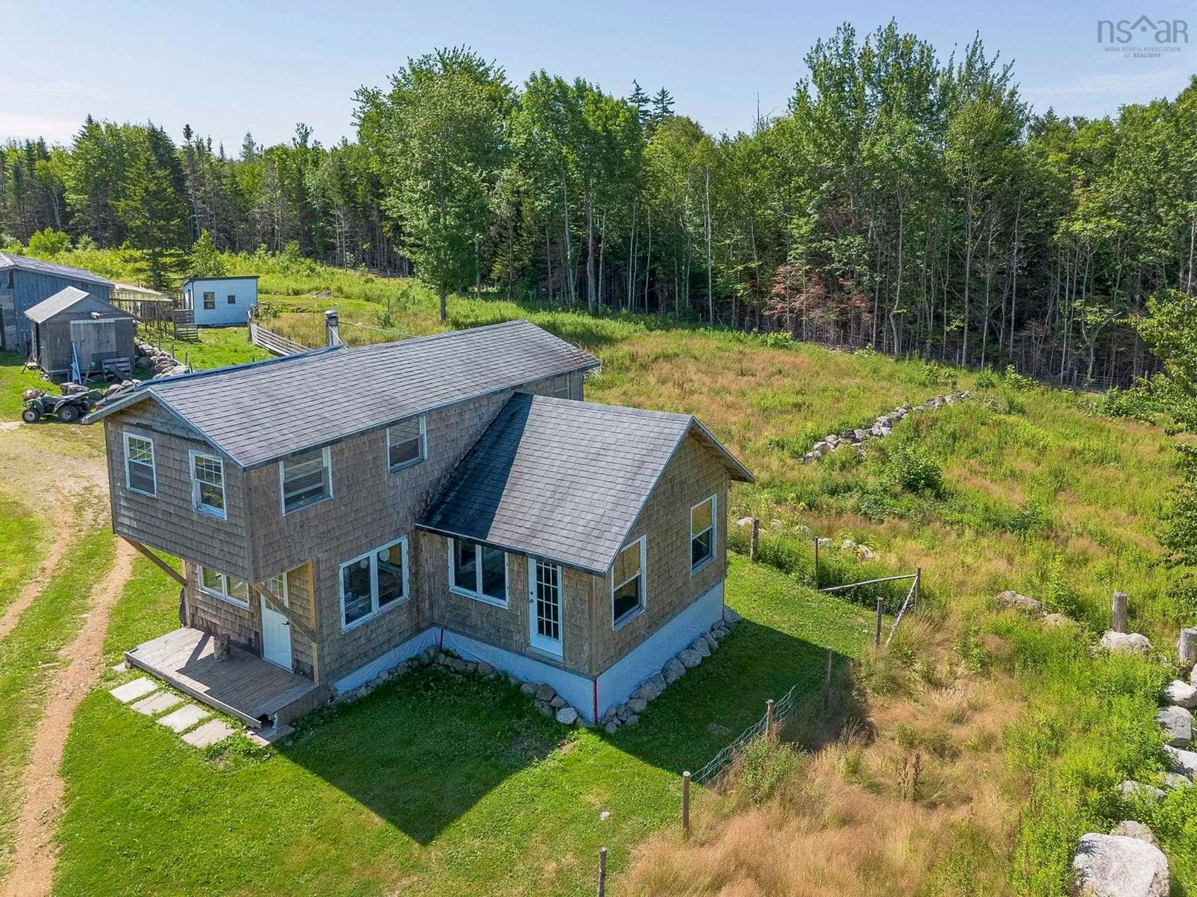 A pic from outside/outdoor area/front of a property/back of a property/a pic from drone, water/lake/river/ocean view for 3828 Sissiboo Rd, South Range Nova Scotia B0W 1H0