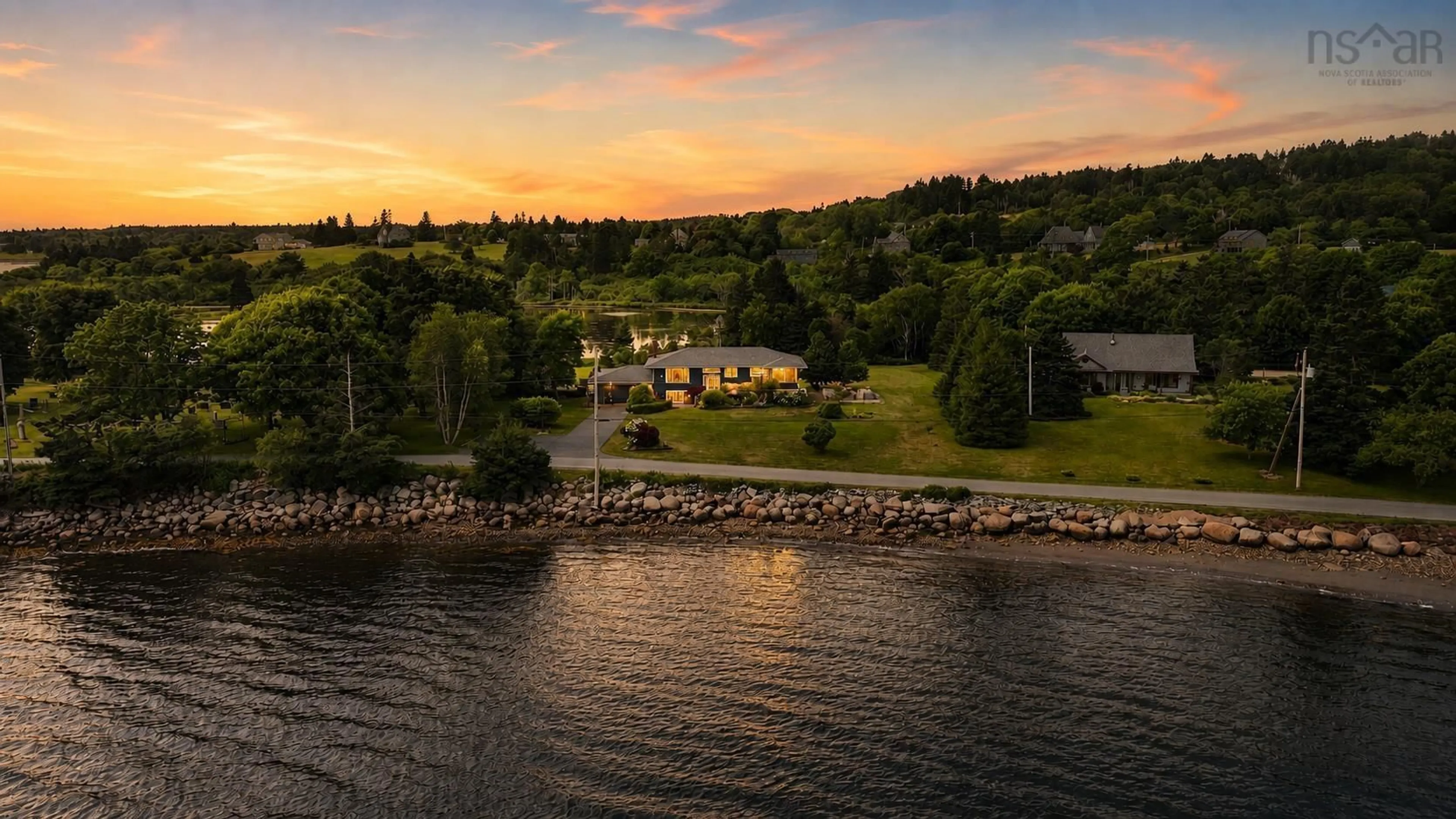 A pic from outside/outdoor area/front of a property/back of a property/a pic from drone, water/lake/river/ocean view for 78 Fort Point Rd, Lahave Nova Scotia B0R 1C0