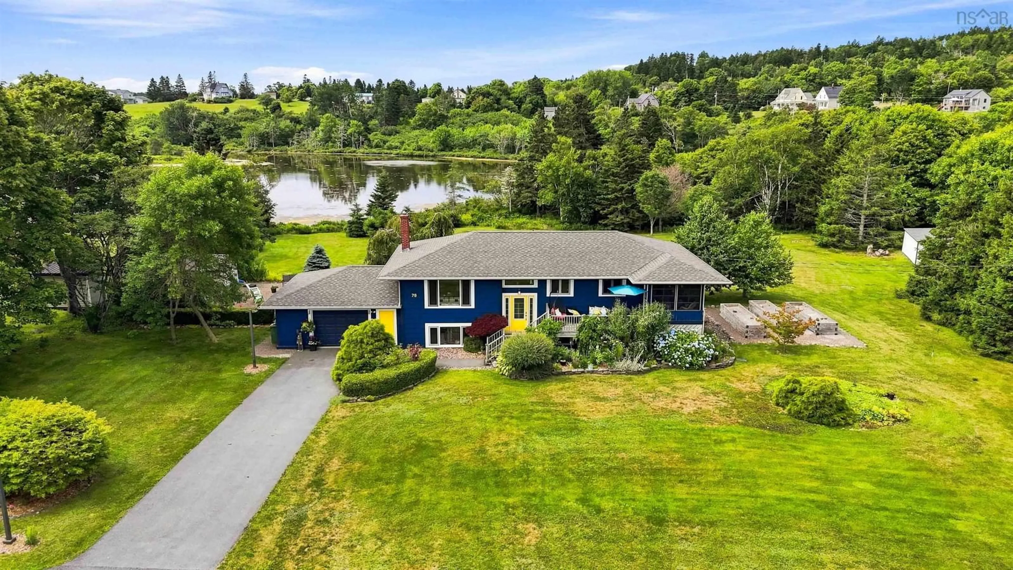A pic from outside/outdoor area/front of a property/back of a property/a pic from drone, water/lake/river/ocean view for 78 Fort Point Rd, Lahave Nova Scotia B0R 1C0