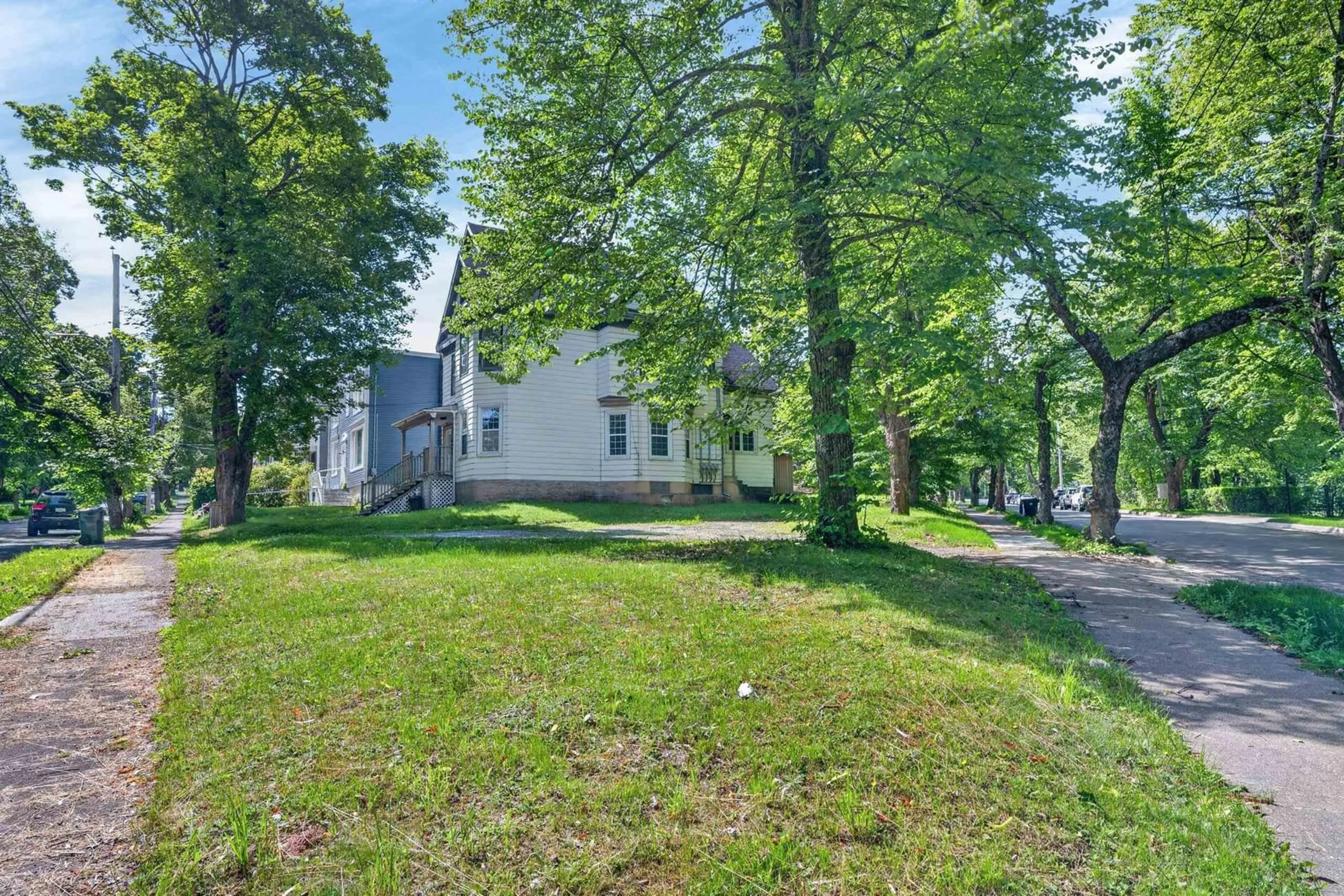 A pic from outside/outdoor area/front of a property/back of a property/a pic from drone, street for 10 Tain Street, Sydney Nova Scotia B1P 1Y4