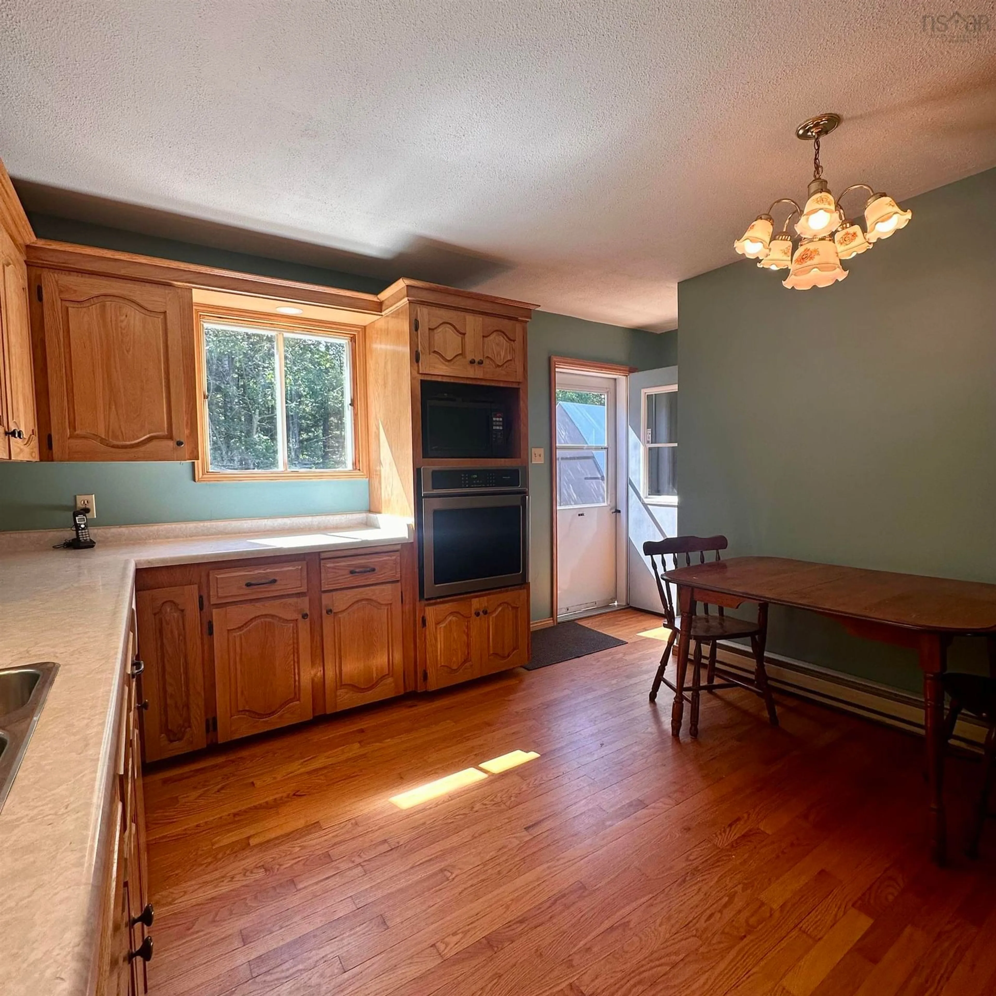 Open concept kitchen, wood/laminate floor for 1229 Northfield Rd, Maitland Nova Scotia B0J 1E0