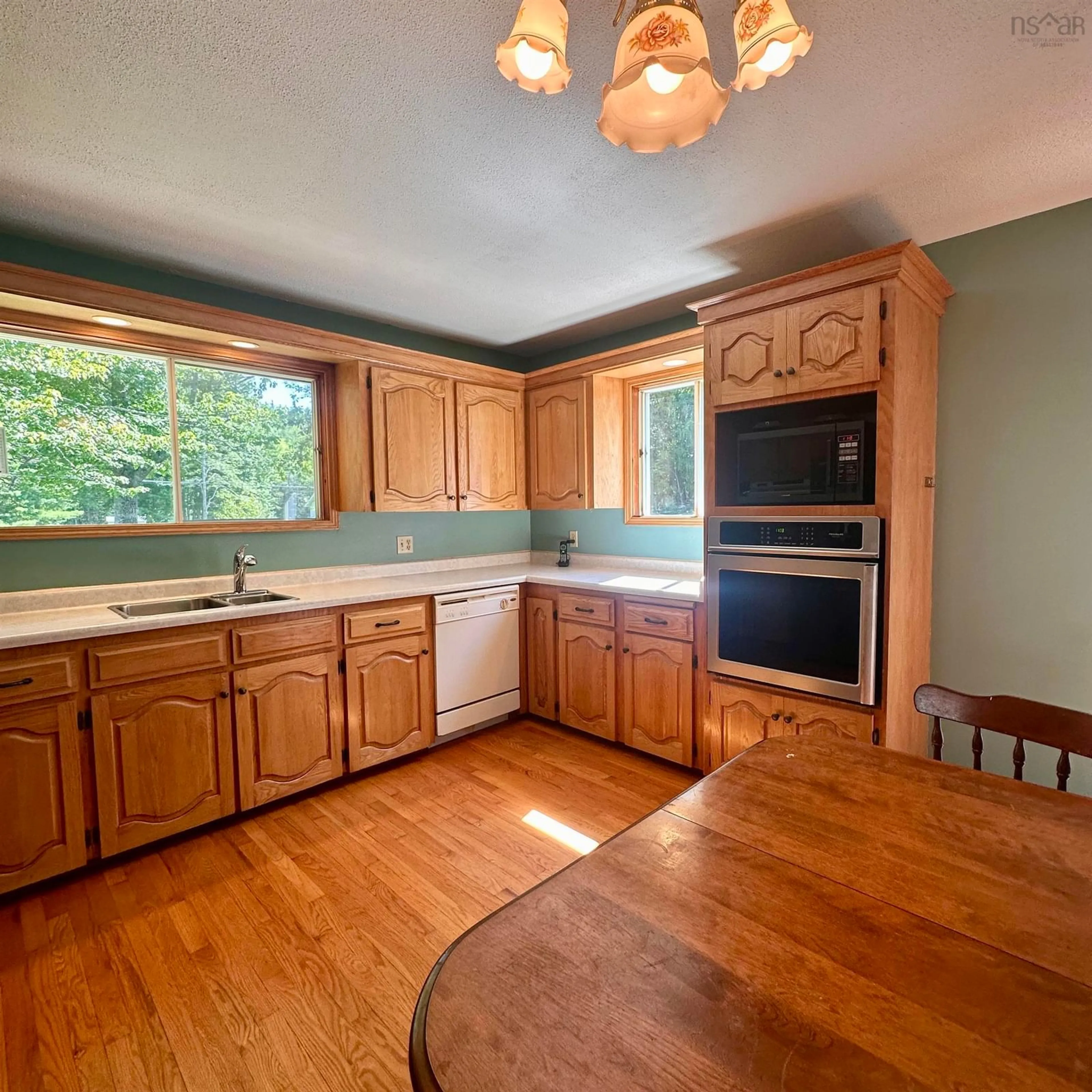 Open concept kitchen, wood/laminate floor for 1229 Northfield Rd, Maitland Nova Scotia B0J 1E0