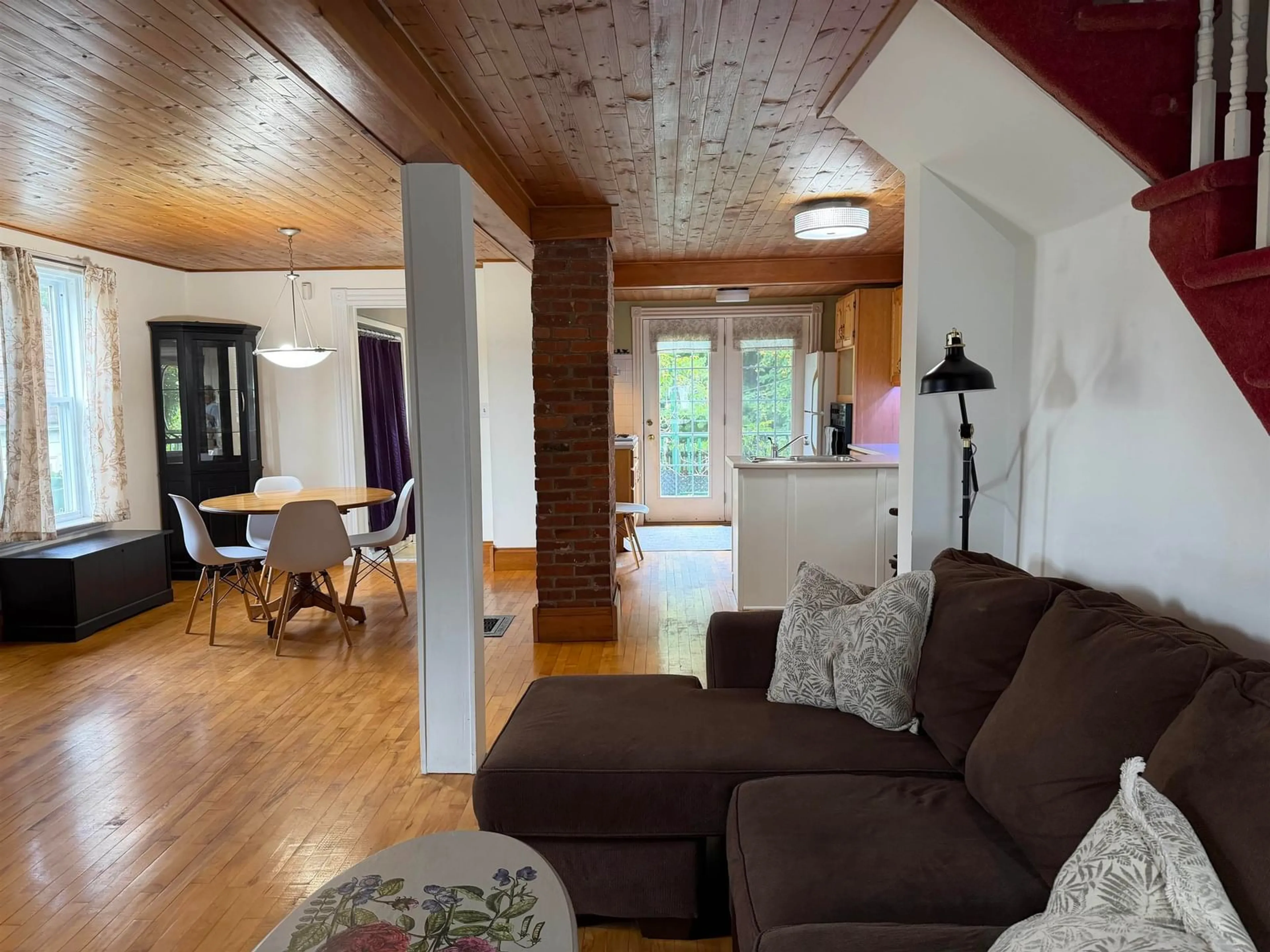 Living room with furniture, wood/laminate floor for 69 Alice St, Truro Nova Scotia B2N 2M8