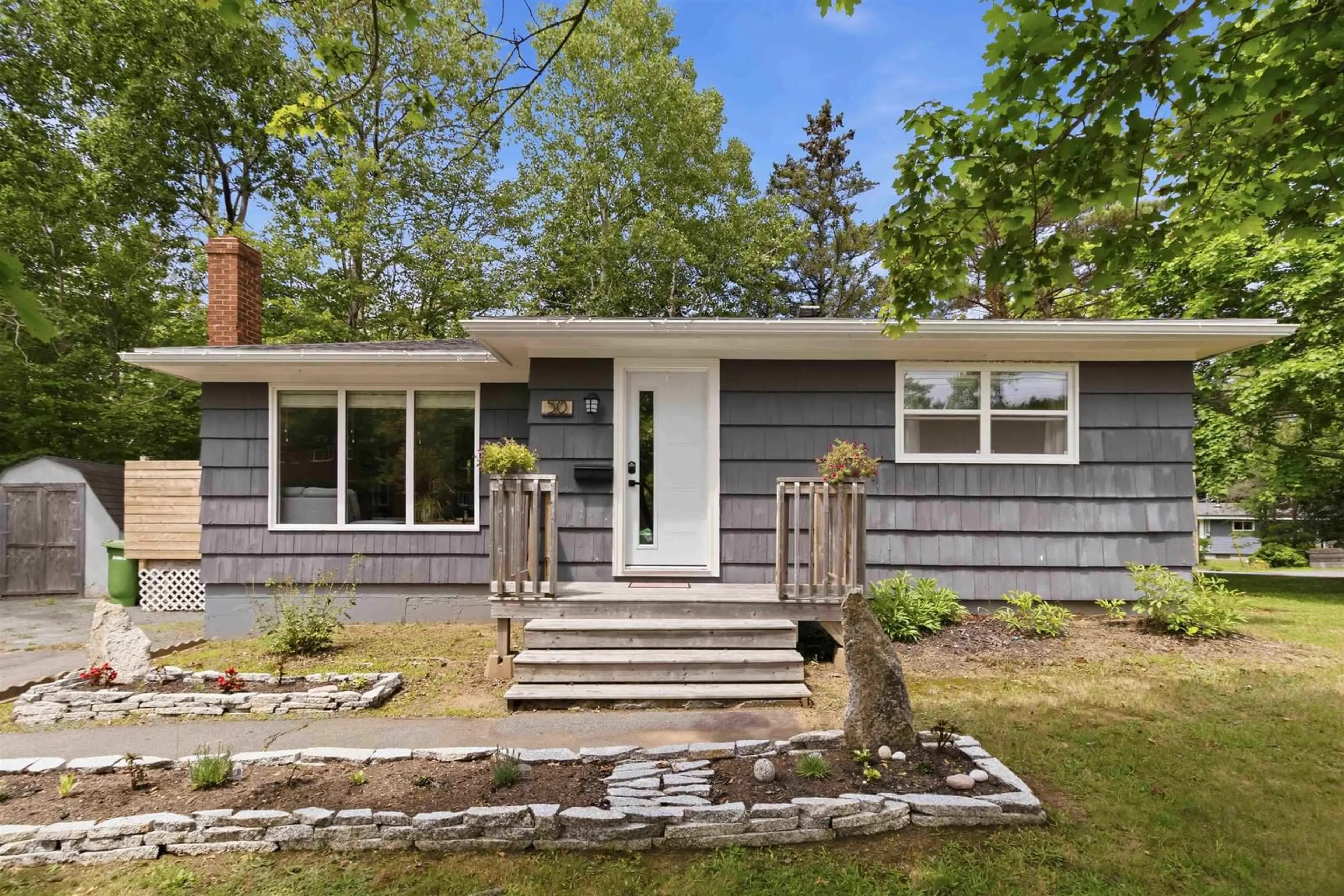 Home with vinyl exterior material, street for 50 Marie Ave, Bridgewater Nova Scotia B4V 3B3