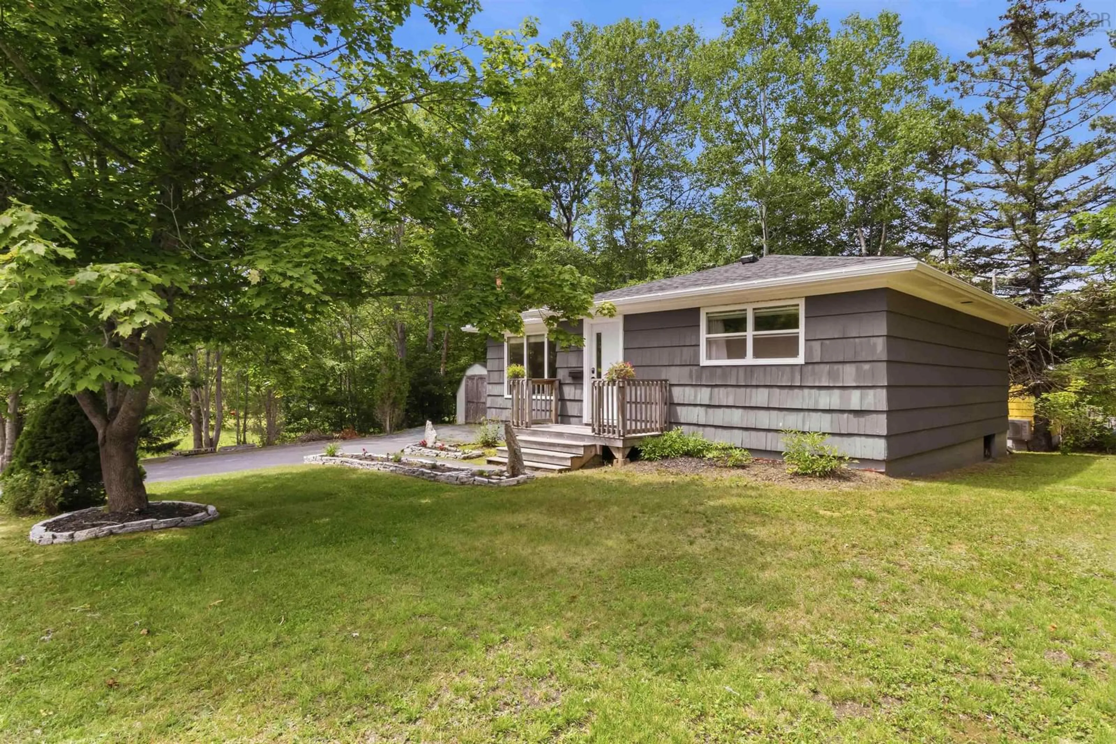 Home with vinyl exterior material, street for 50 Marie Ave, Bridgewater Nova Scotia B4V 3B3