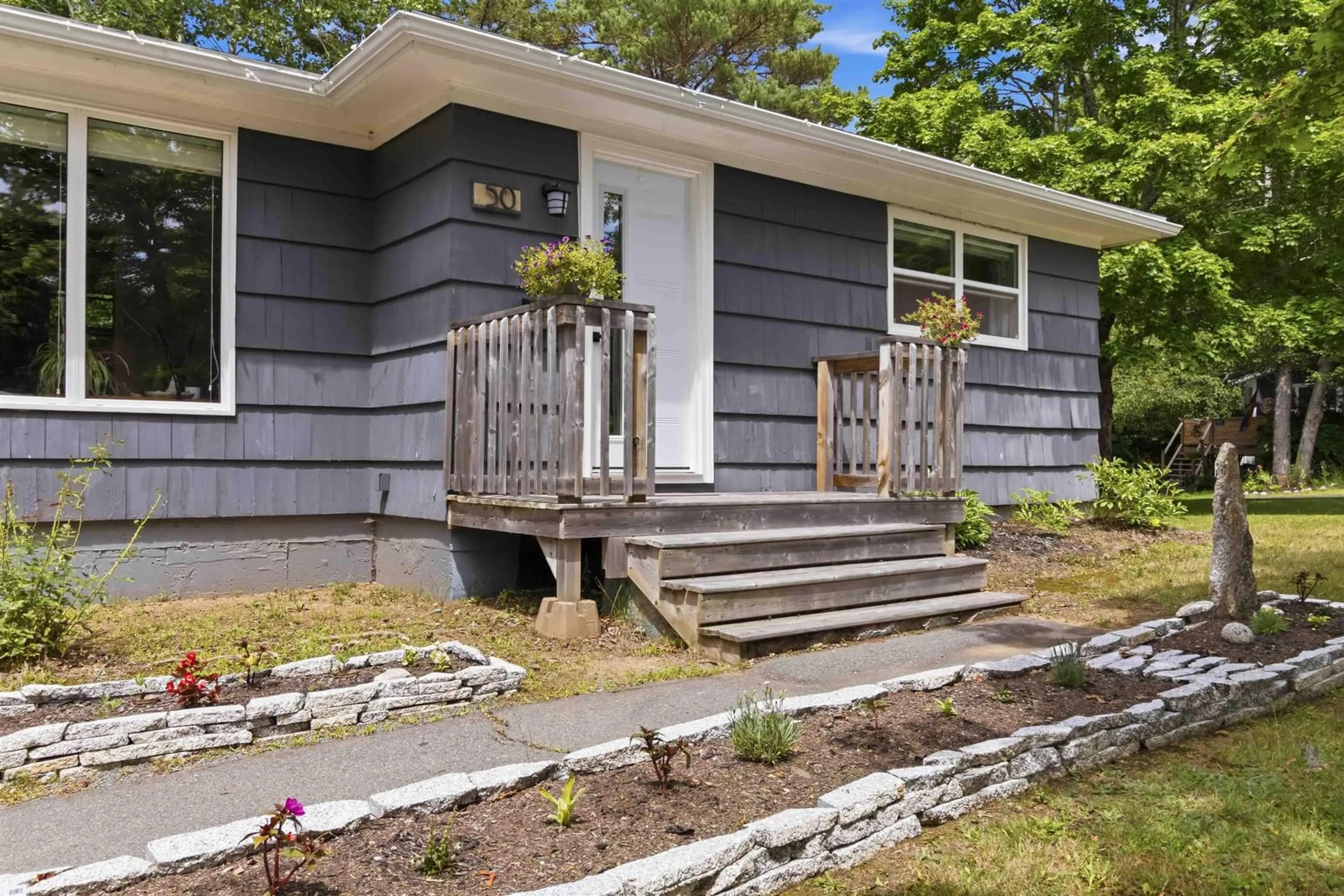 Home with vinyl exterior material, street for 50 Marie Ave, Bridgewater Nova Scotia B4V 3B3