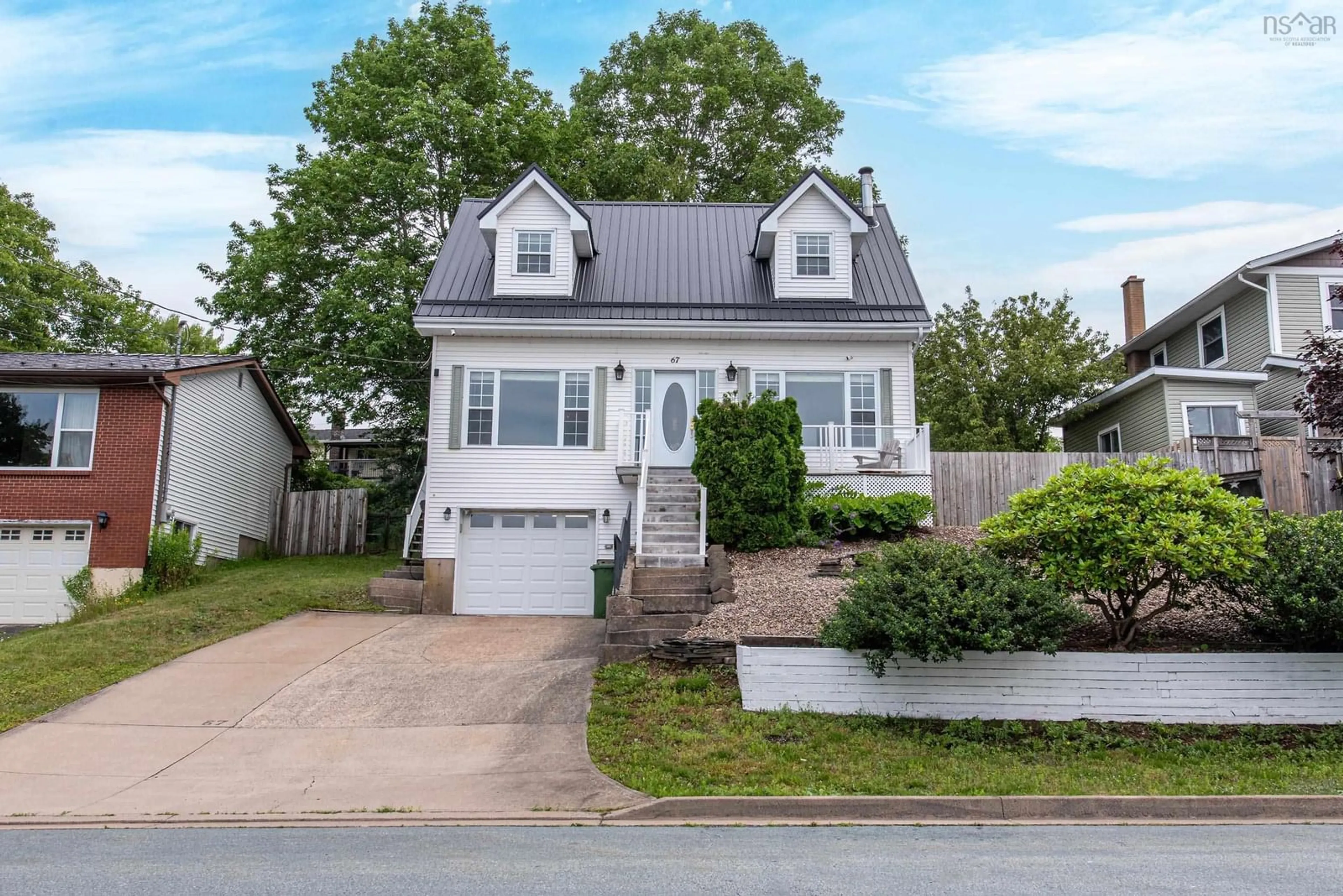Home with vinyl exterior material, street for 67 Gourok Ave, Dartmouth Nova Scotia B2X 1K6