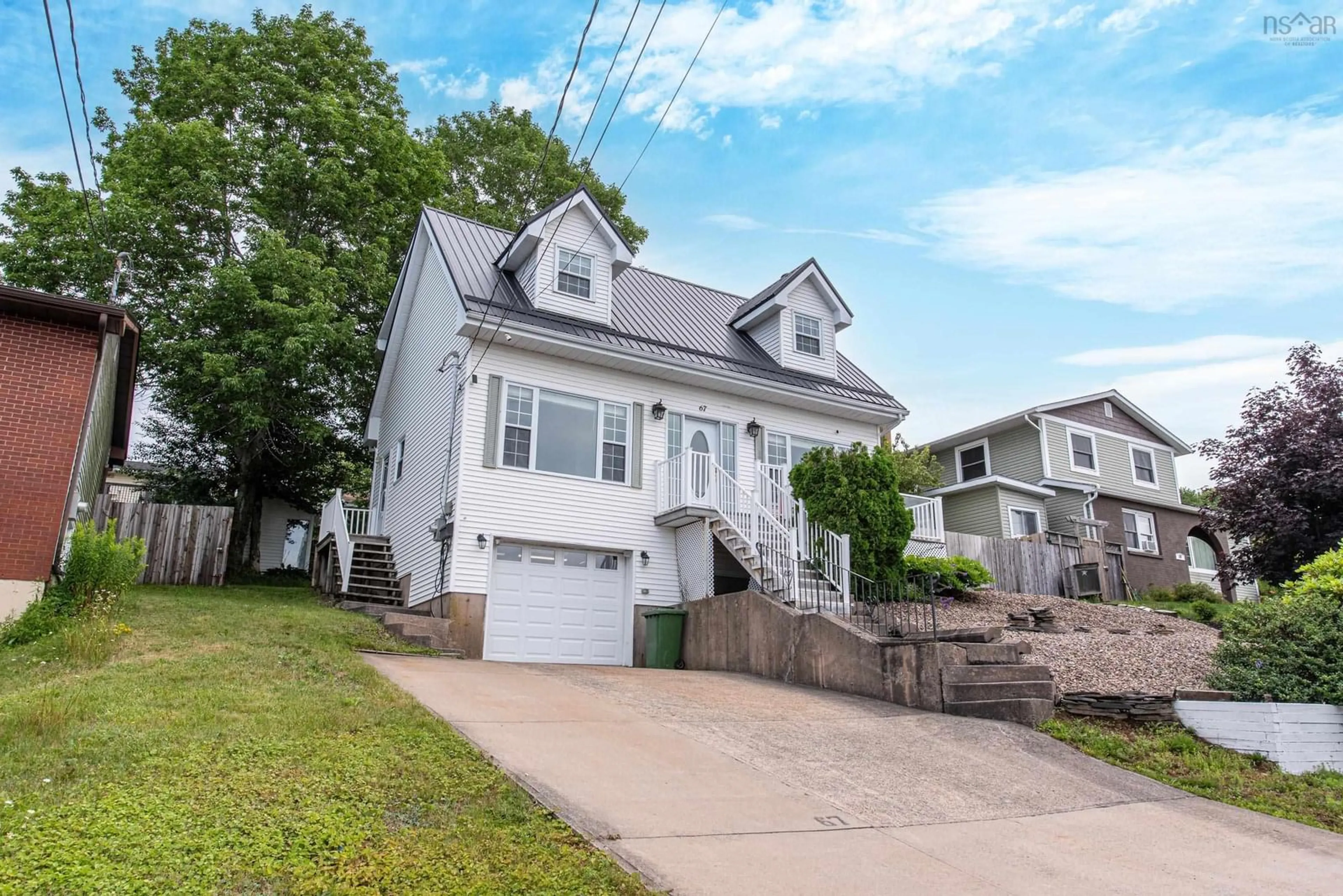 Home with vinyl exterior material, street for 67 Gourok Ave, Dartmouth Nova Scotia B2X 1K6