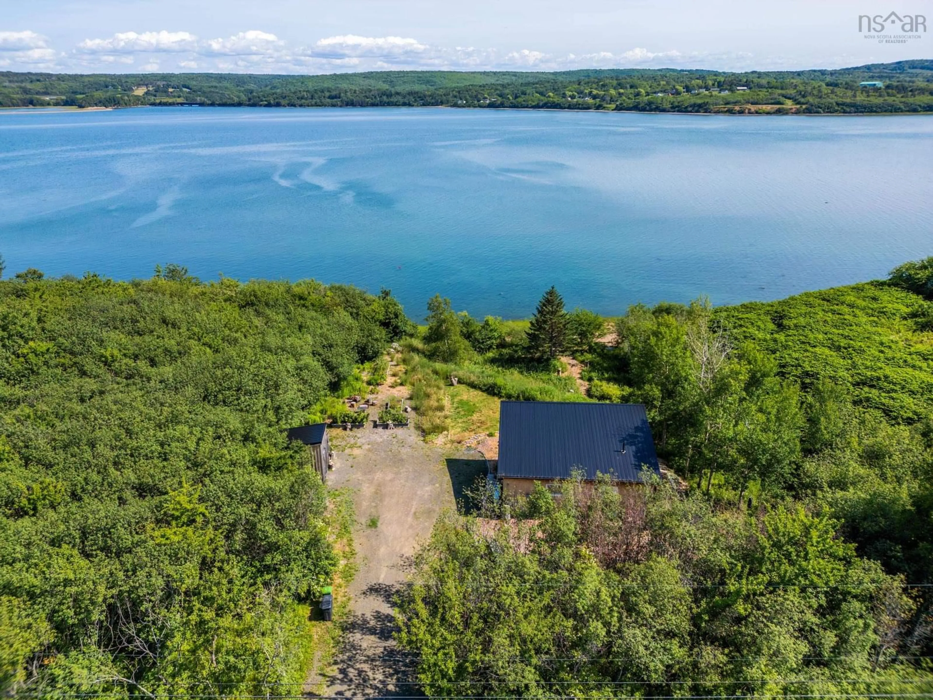 A pic from outside/outdoor area/front of a property/back of a property/a pic from drone, water/lake/river/ocean view for 27 Thomas Road, Digby Nova Scotia B0V 1A0