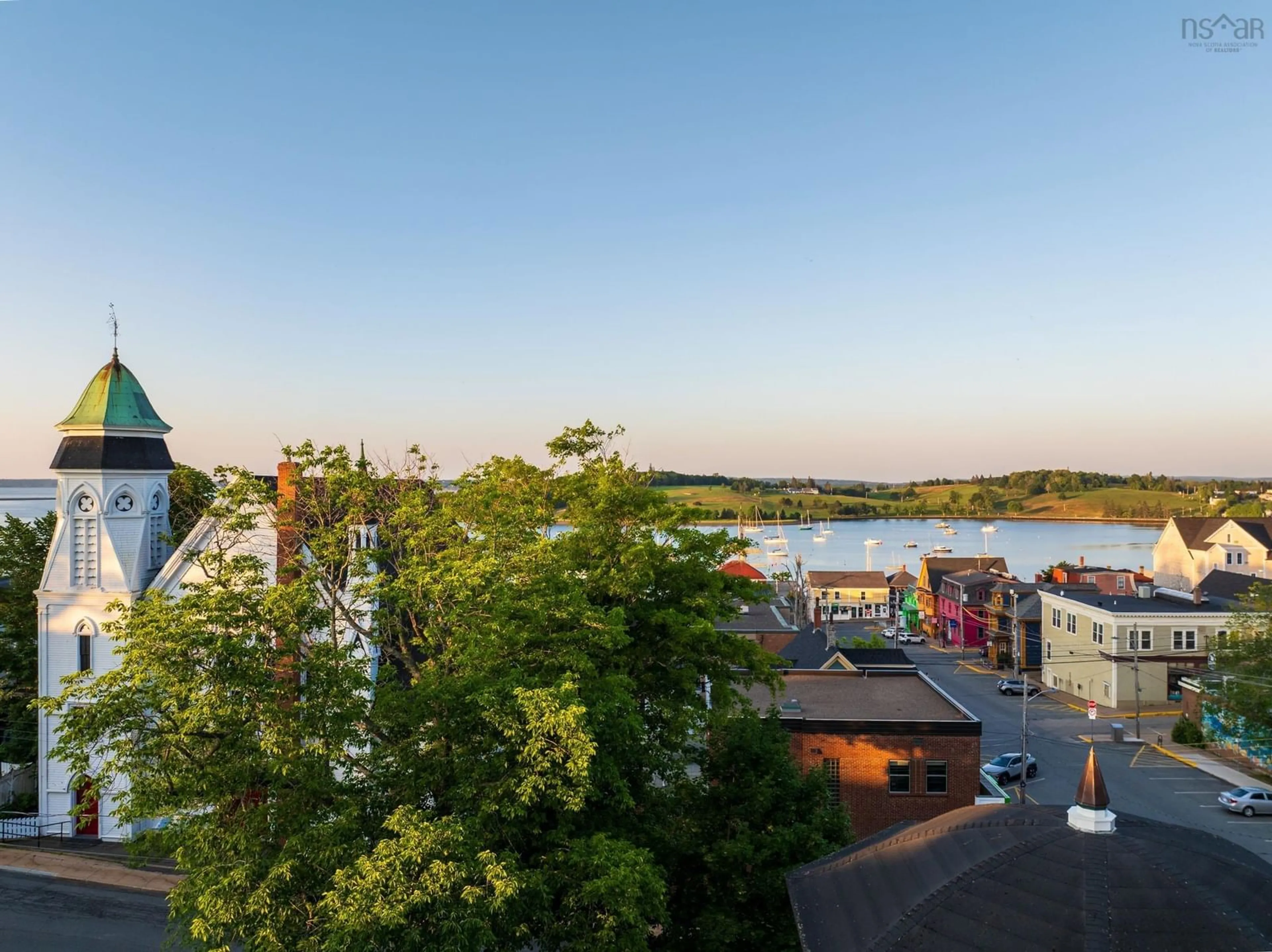 A pic from outside/outdoor area/front of a property/back of a property/a pic from drone, city buildings view from balcony for 129 Townsend St, Lunenburg Nova Scotia B0J 2C0
